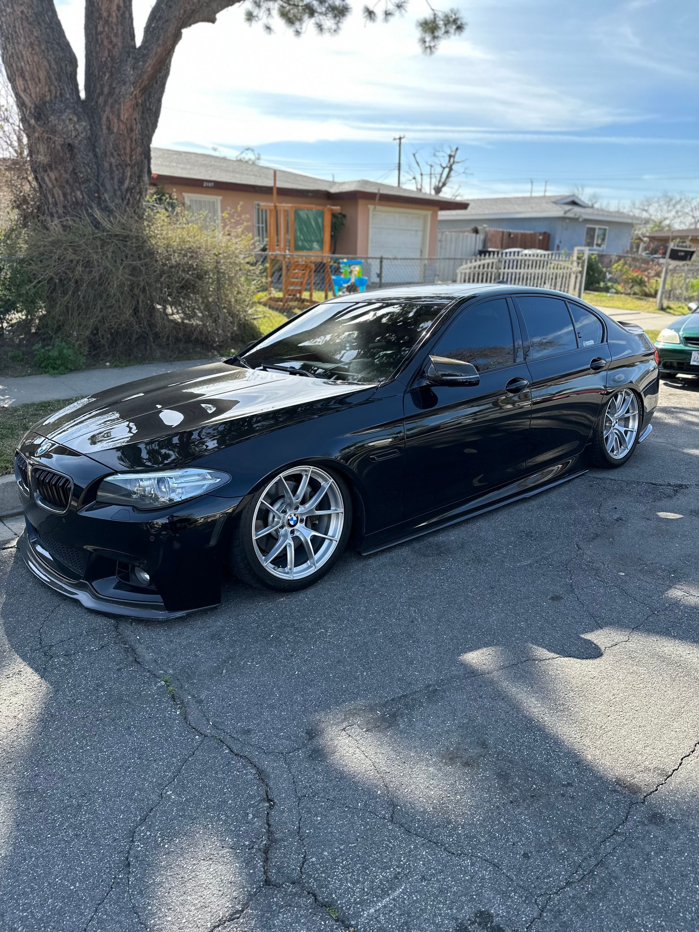 Black BMW F10 Sedan 5 Series with 19" VS-5RS Apex wheels in Brushed Clear