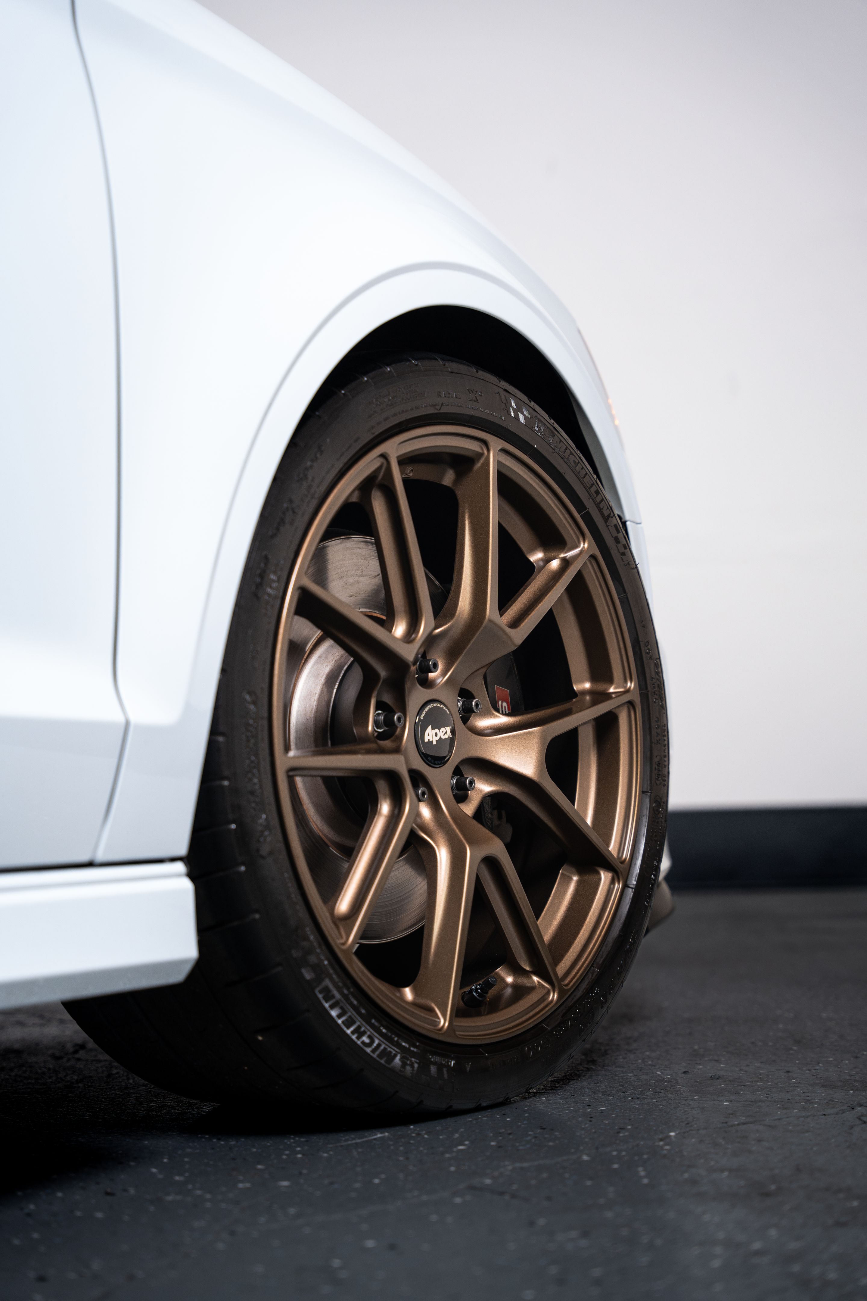 White Audi 8V S3 with 18" VS-5 Apex wheels in Satin Bronze