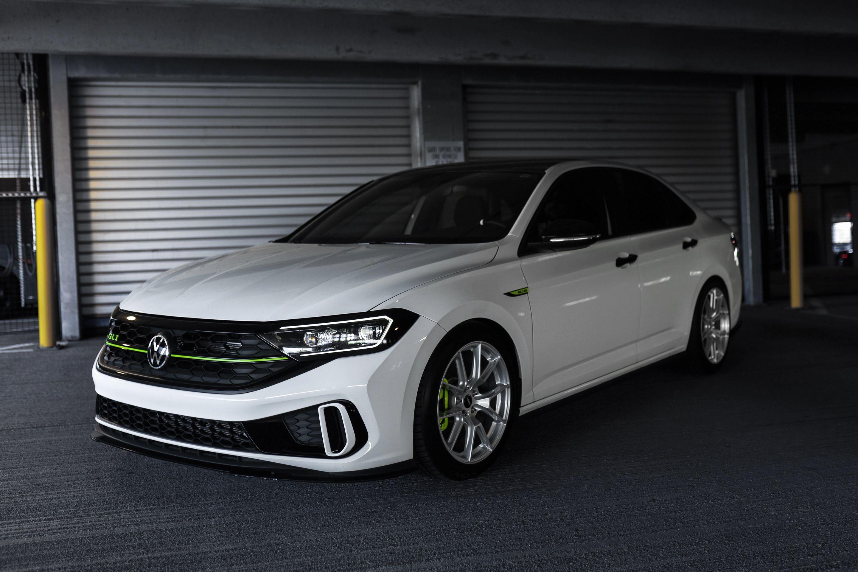 White VW MK7 GLI with 18" VS-5 Apex wheels in Race Silver