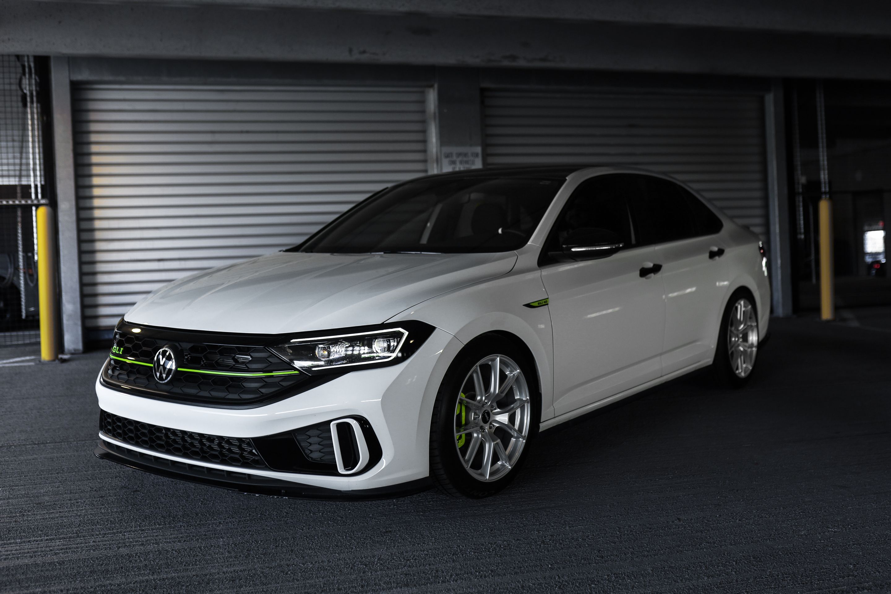 White VW MK7 GLI with 18" VS-5 Apex wheels in Race Silver