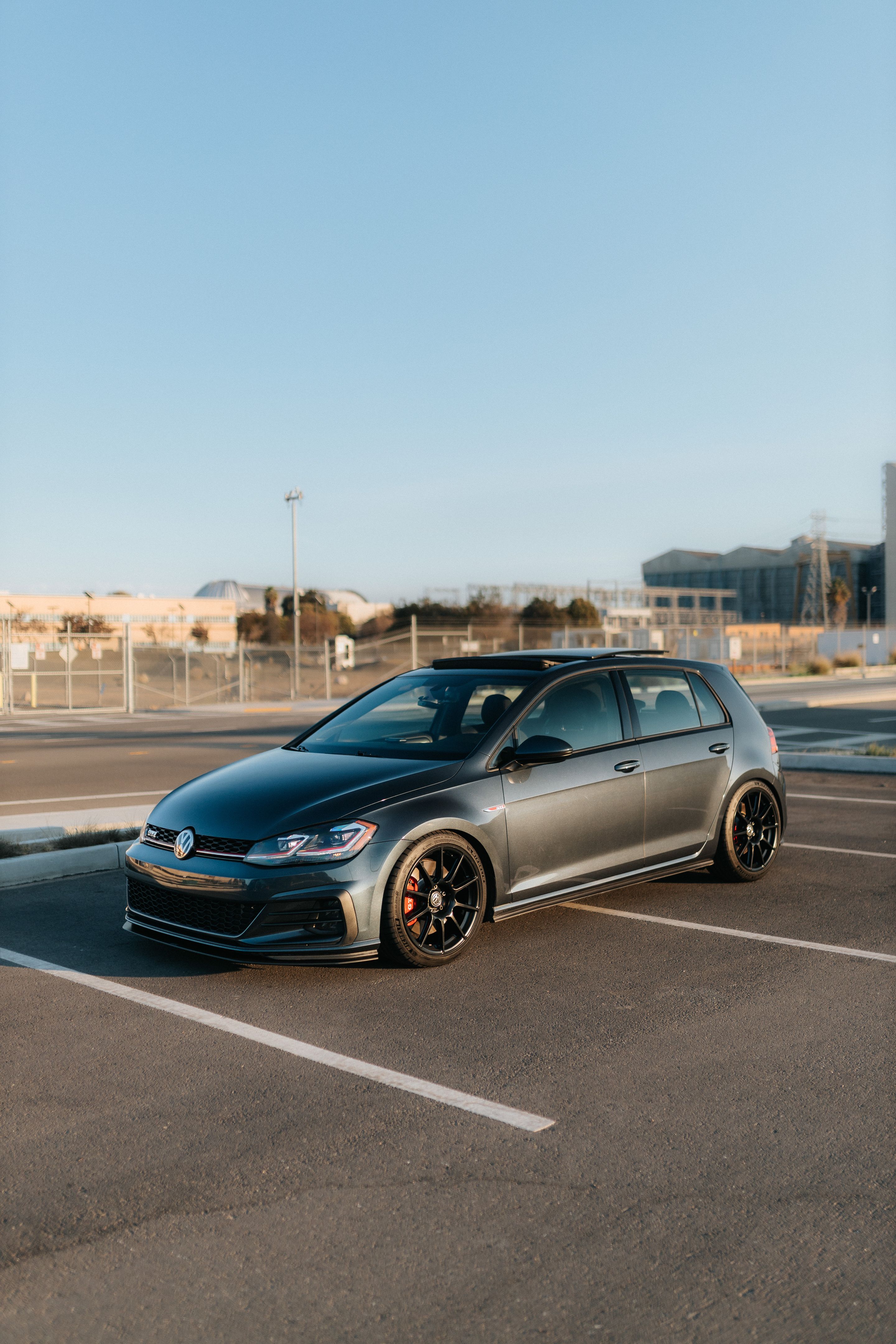 Grey VW MK7 GTI with 18" SM-10 Apex wheels in Satin Black