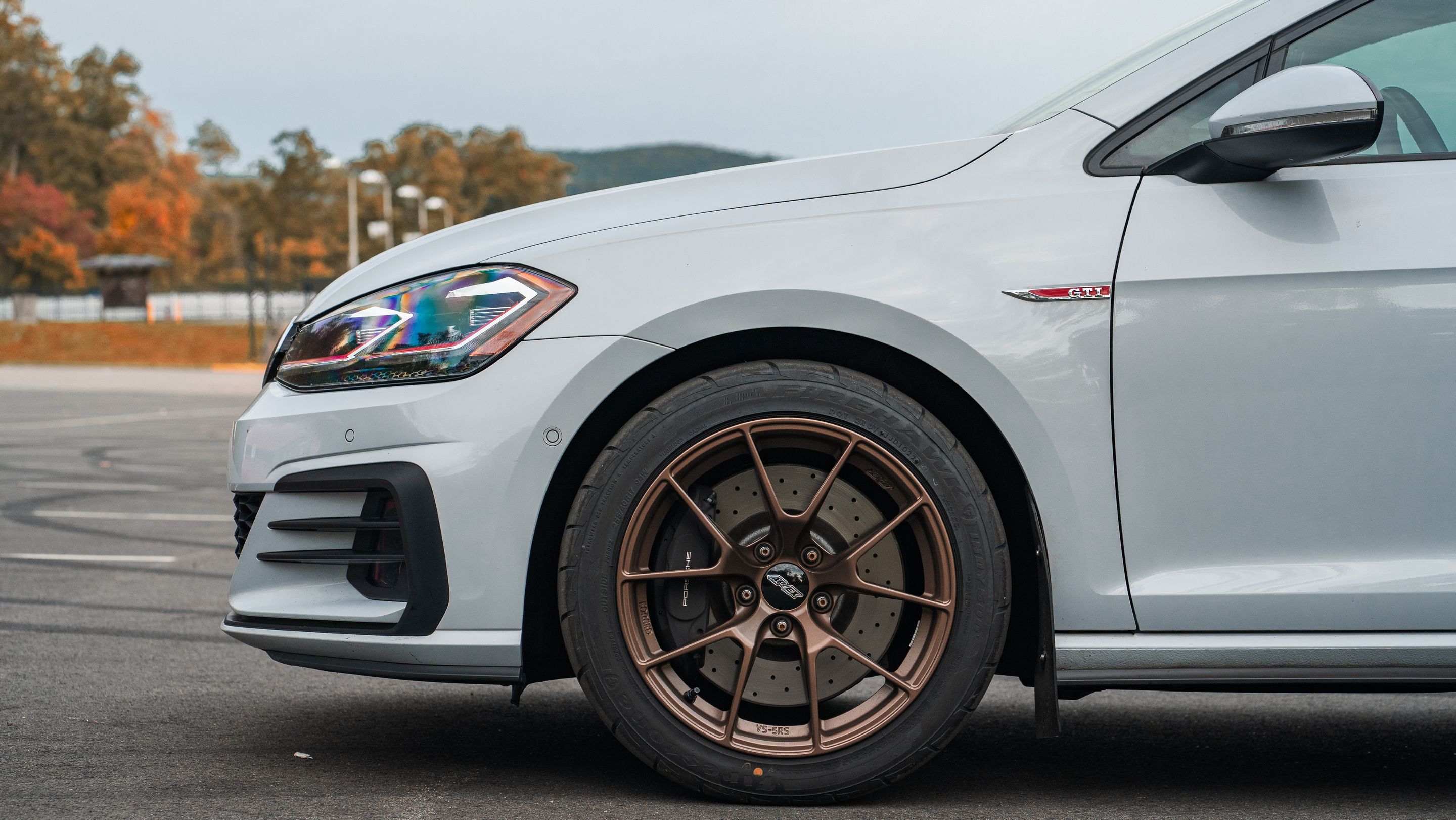 Grey VW MK7 GTI with 17" VS-5RS Apex wheels in Satin Bronze