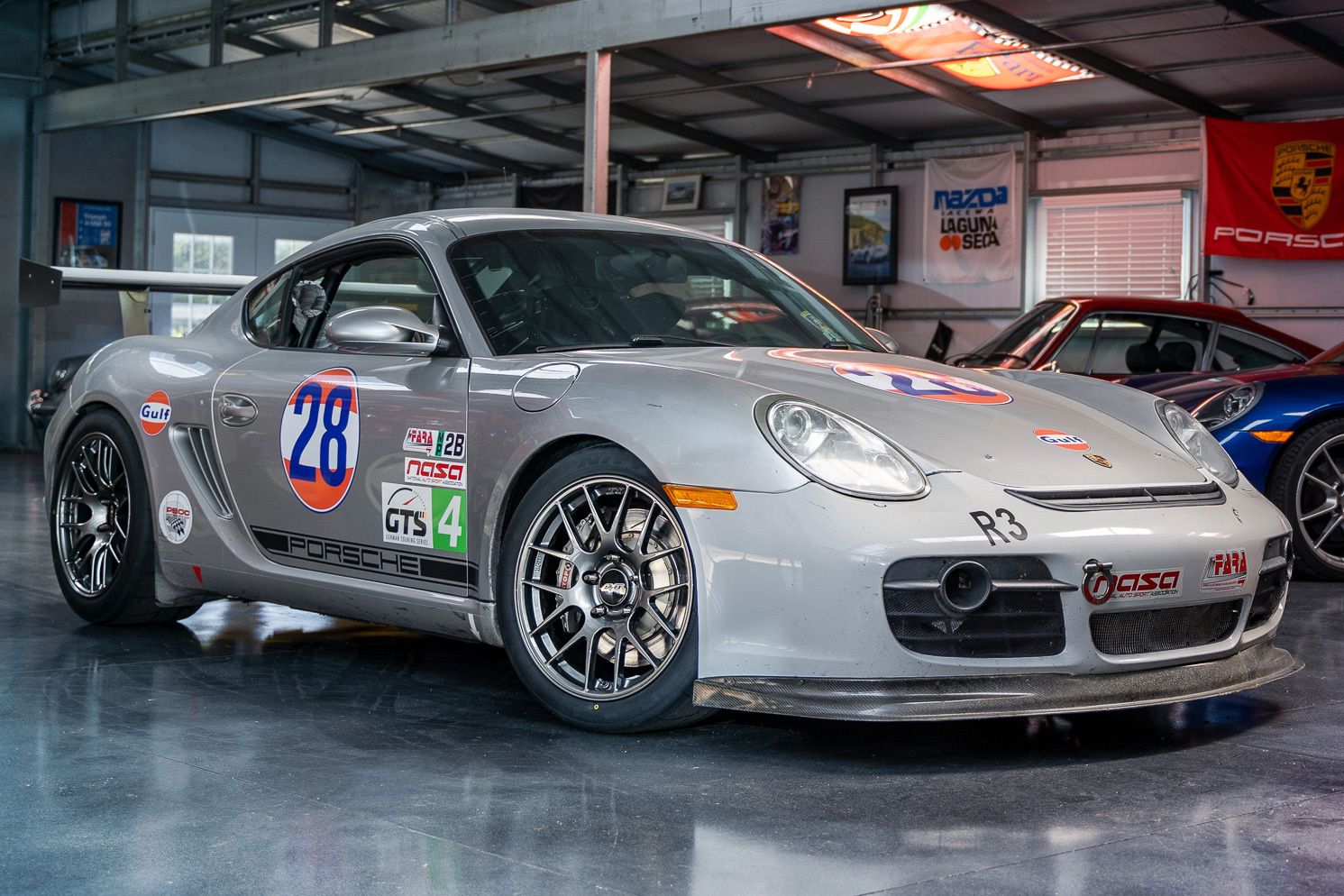 Grey Porsche 987 Cayman S with 18" EC-7R Apex wheels in Anthracite