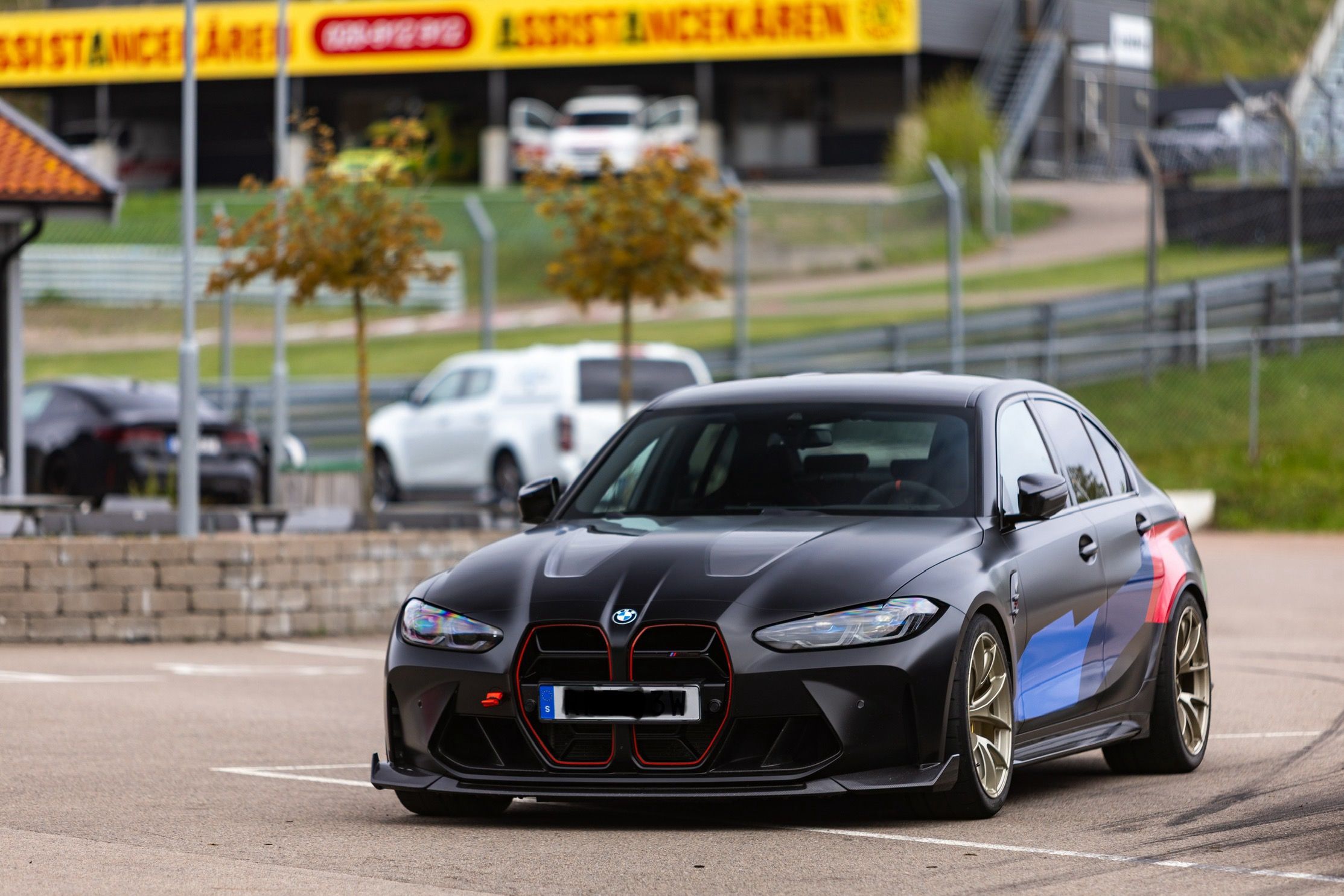 Black BMW G80 M3 with 19" VS-5RS Apex wheels in Motorsport Gold