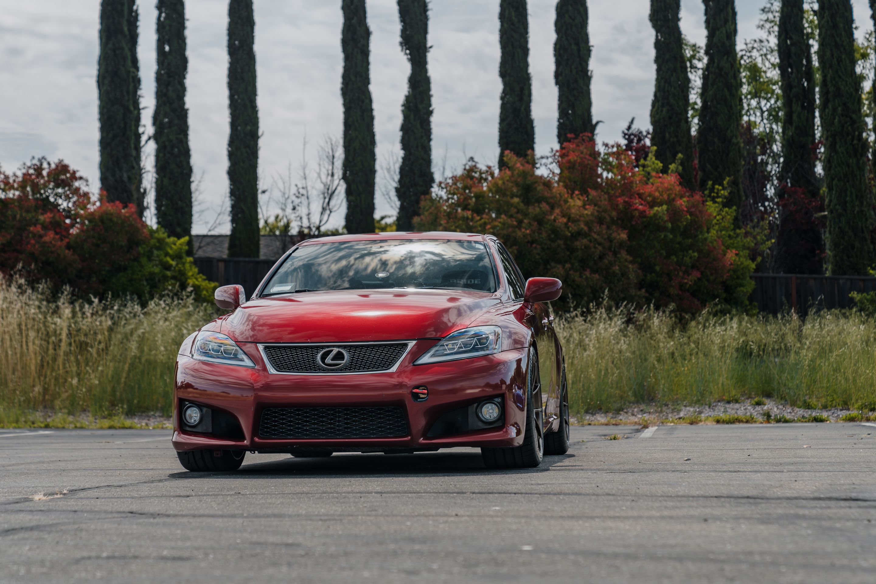 Red Lexus USE20 IS-F with 18" VS-5RS Apex wheels in Satin Bronze