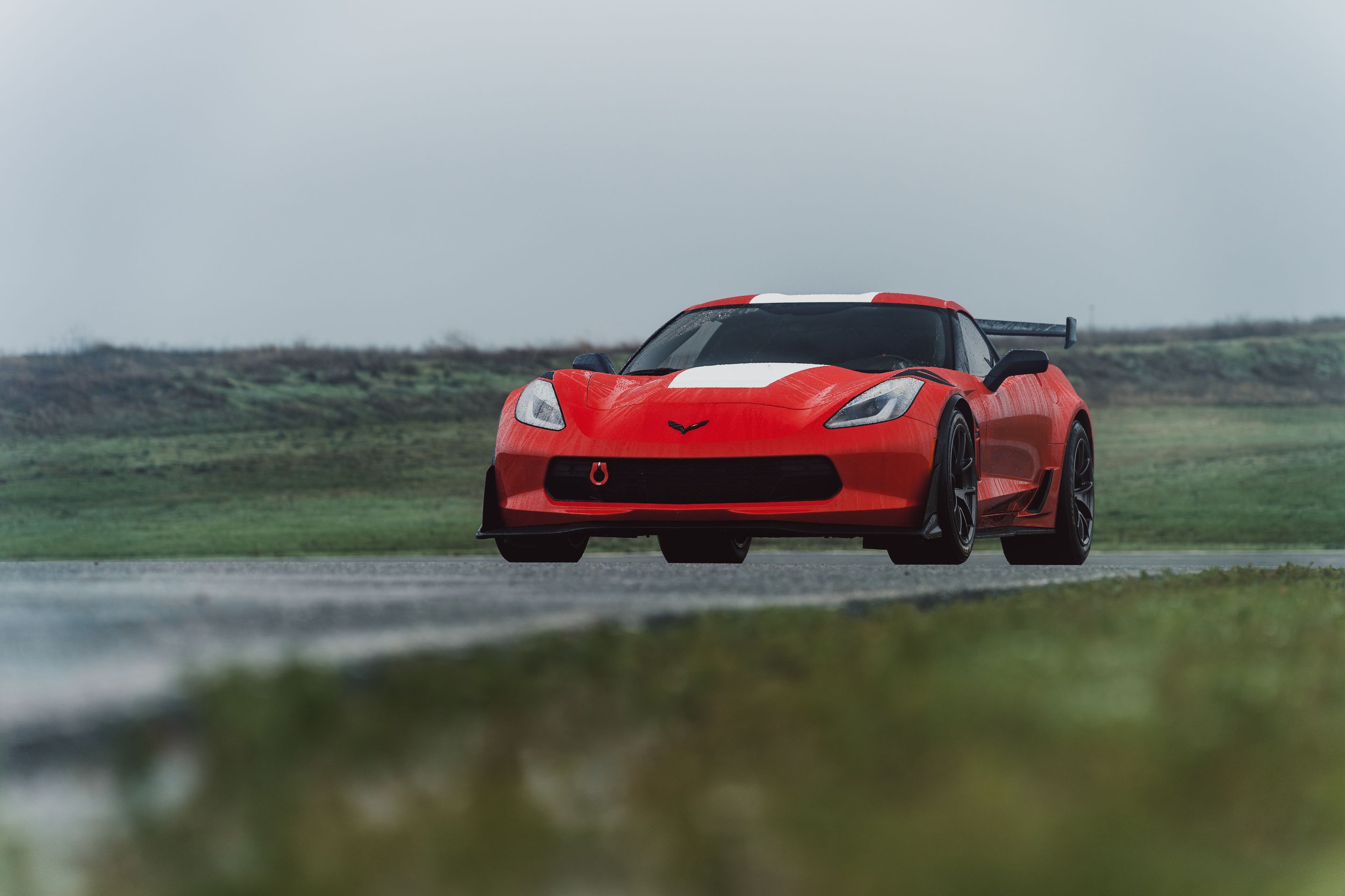 Red Chevrolet C7 Corvette Grand Sport with 18" VS-5RE Apex wheels in Anthracite