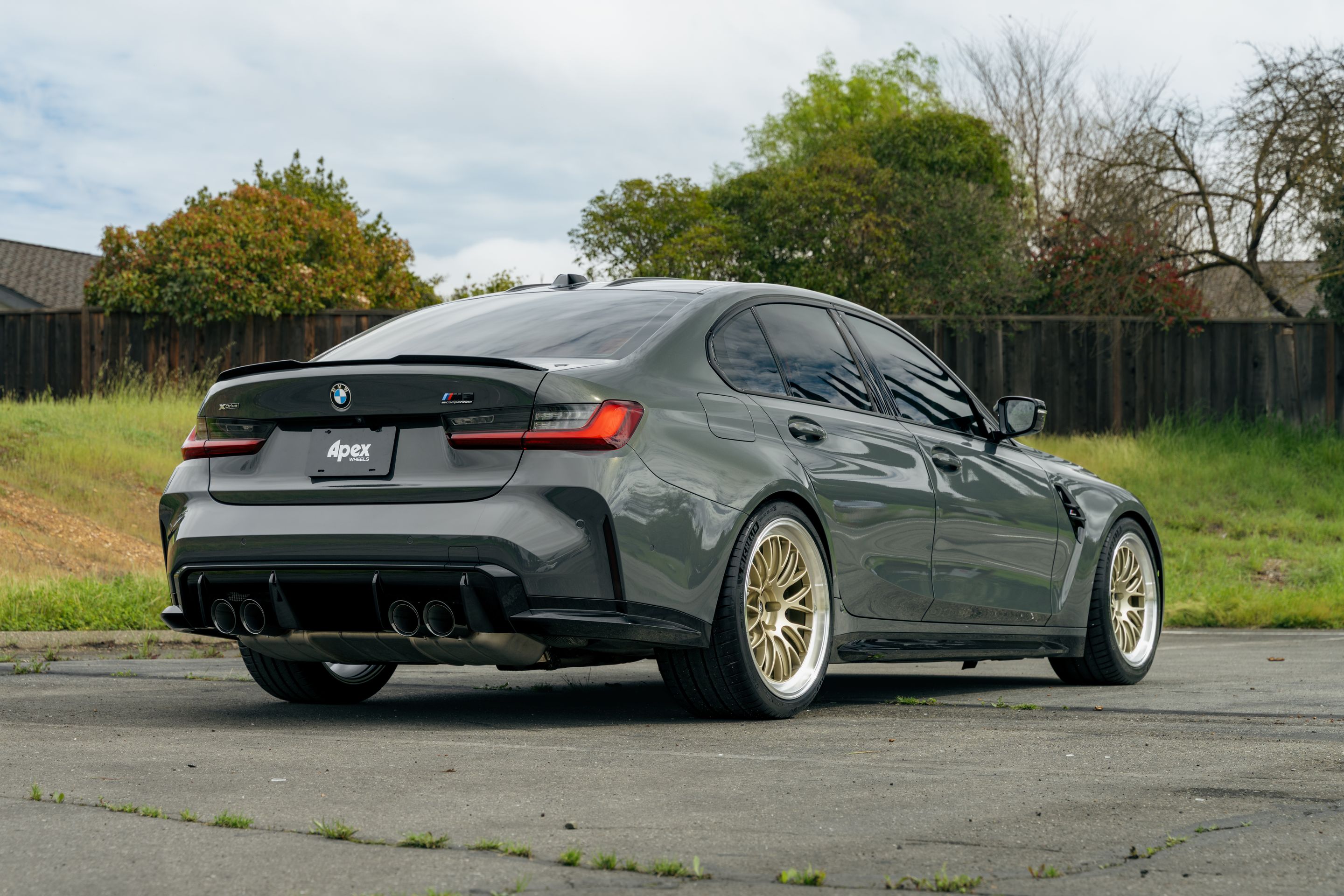Grey BMW G80 M3 with 19"/20" ML-10RT Apex wheels in Machined Lip Gloss Motorsport Gold