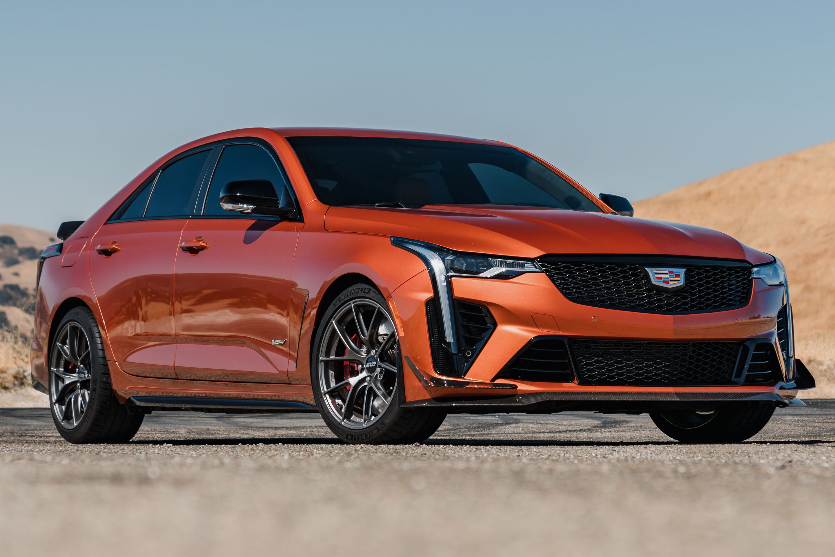 Orange Cadillac CT4-V Blackwing with 18" VS-5RS Apex wheels in Anthracite