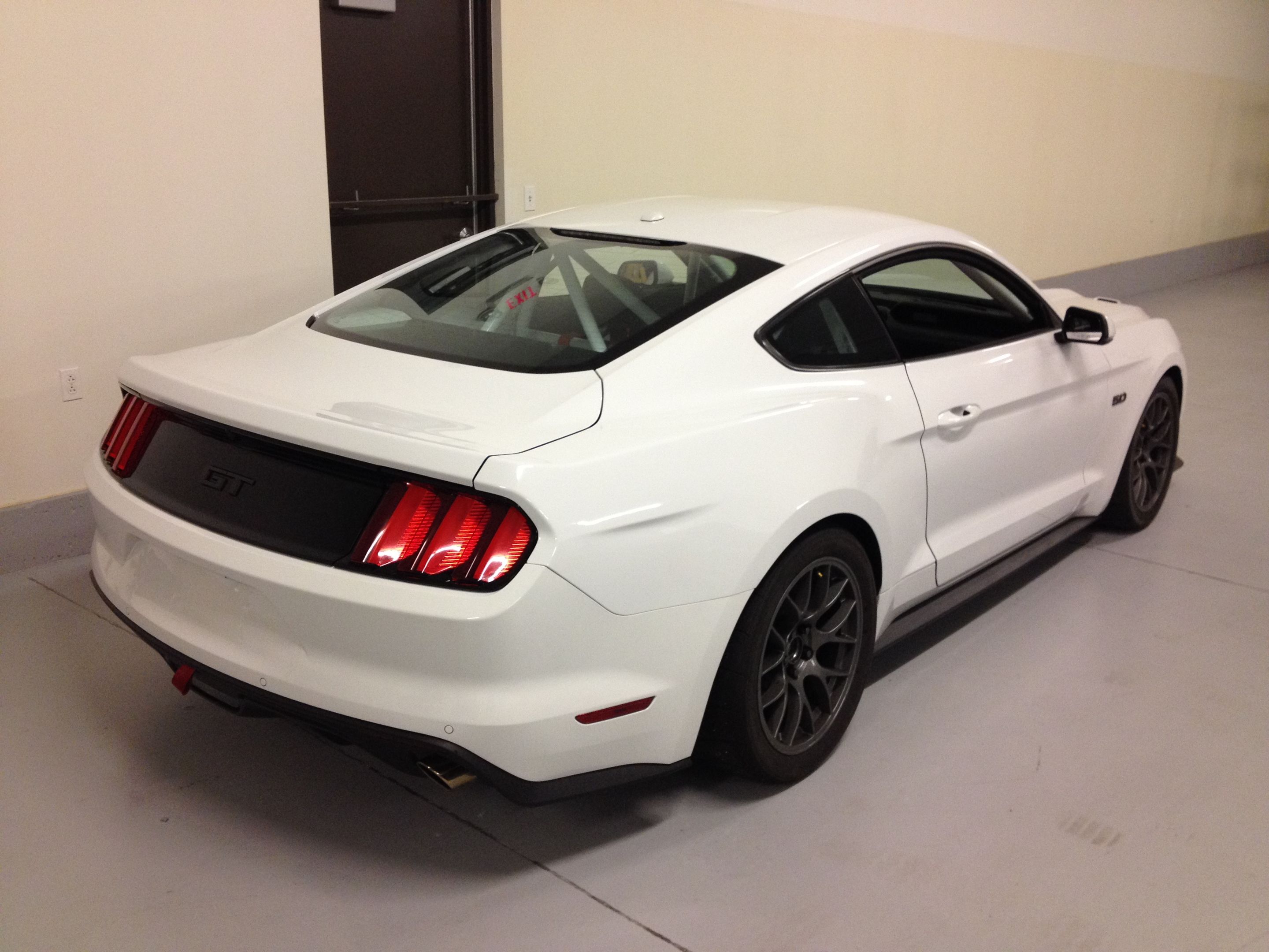 White Ford S550 Mustang GT with 18" EC-7 Apex wheels in Anthracite
