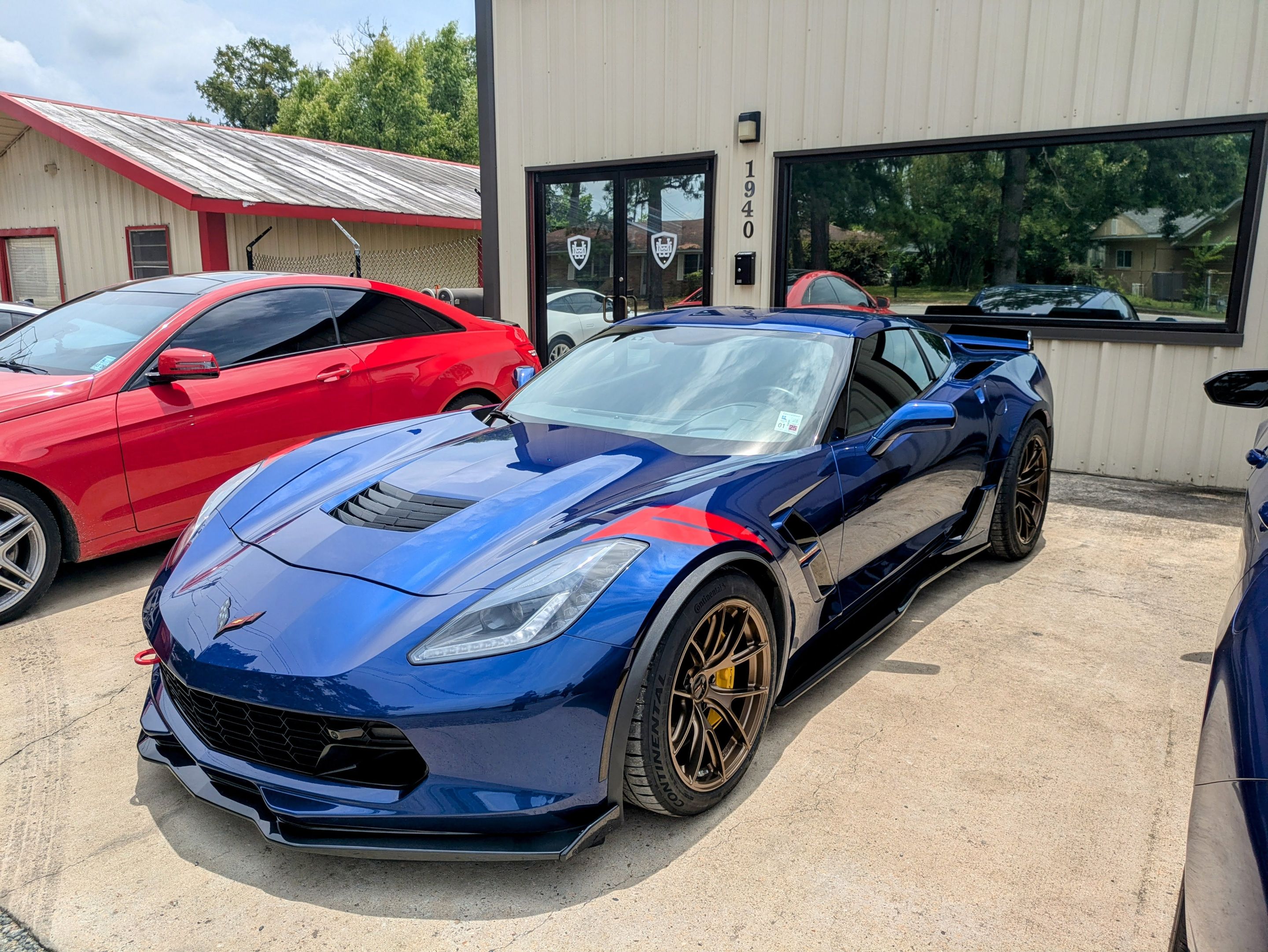 Blue Chevrolet C7 Corvette Grand Sport with 18"/19" VS-5RS Apex wheels in Satin Bronze