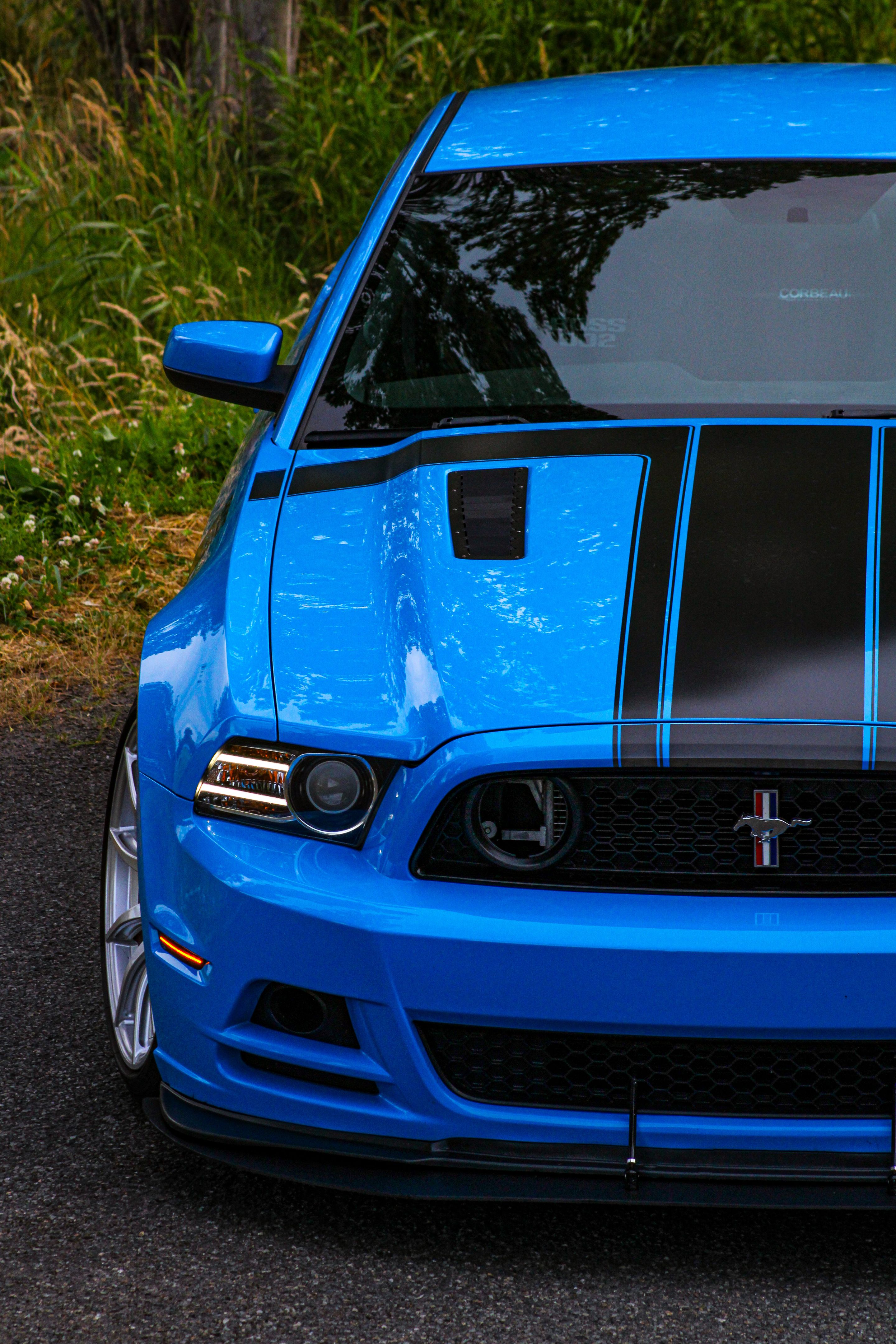 Blue Ford S197 Mustang Boss 302 with 19" SM-10 Apex wheels in Race Silver