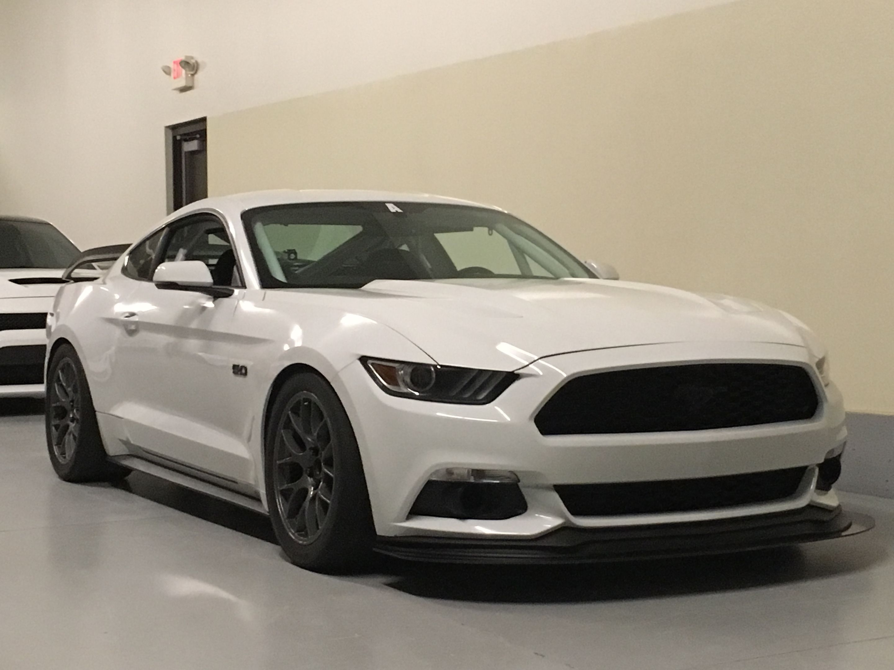 White Ford S550 Mustang GT with 18" EC-7 Apex wheels in Anthracite