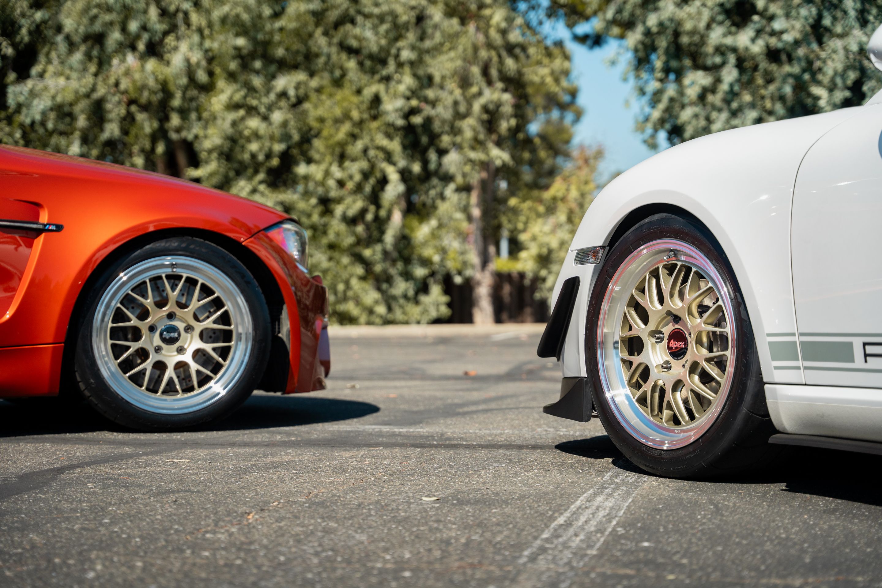 Orange BMW E82 1M with 18" ML-10RT Apex wheels in Machined Lip Gloss Motorsport Gold
