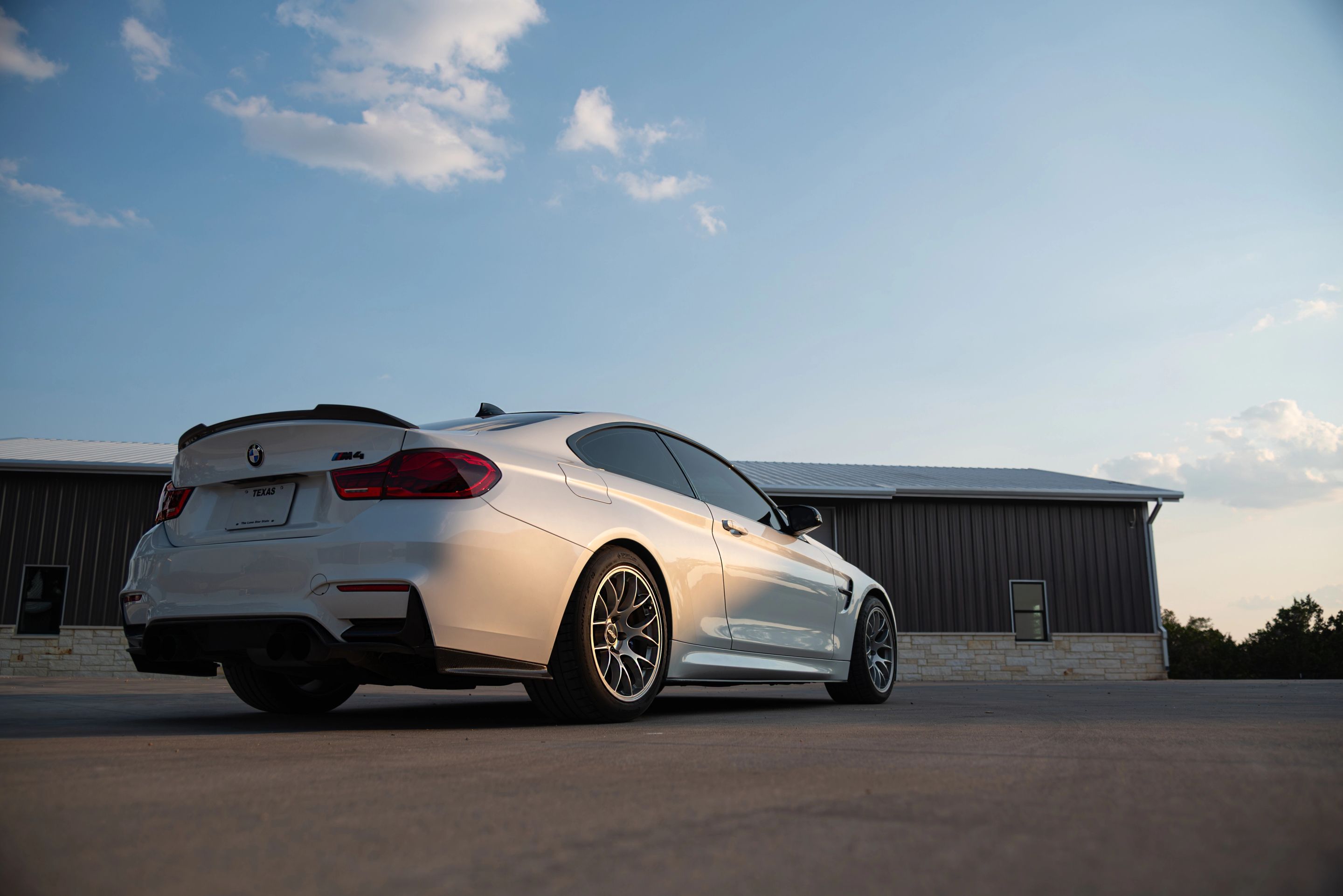 White BMW F82 Coupe M4 with 18" EC-7 Apex wheels in Race Silver