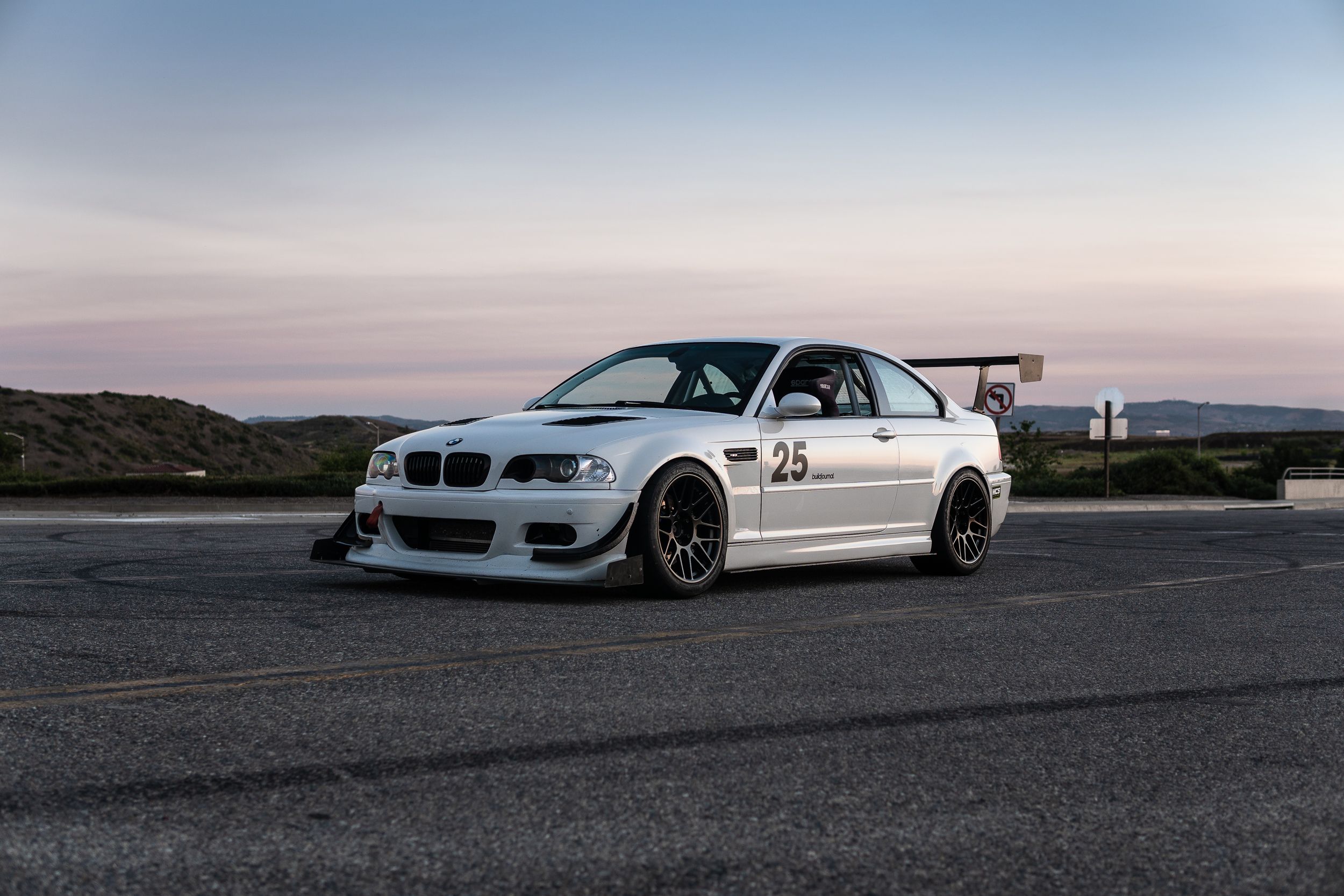 White BMW E46 M3 with 18" ARC-8R Apex wheels in Satin Black