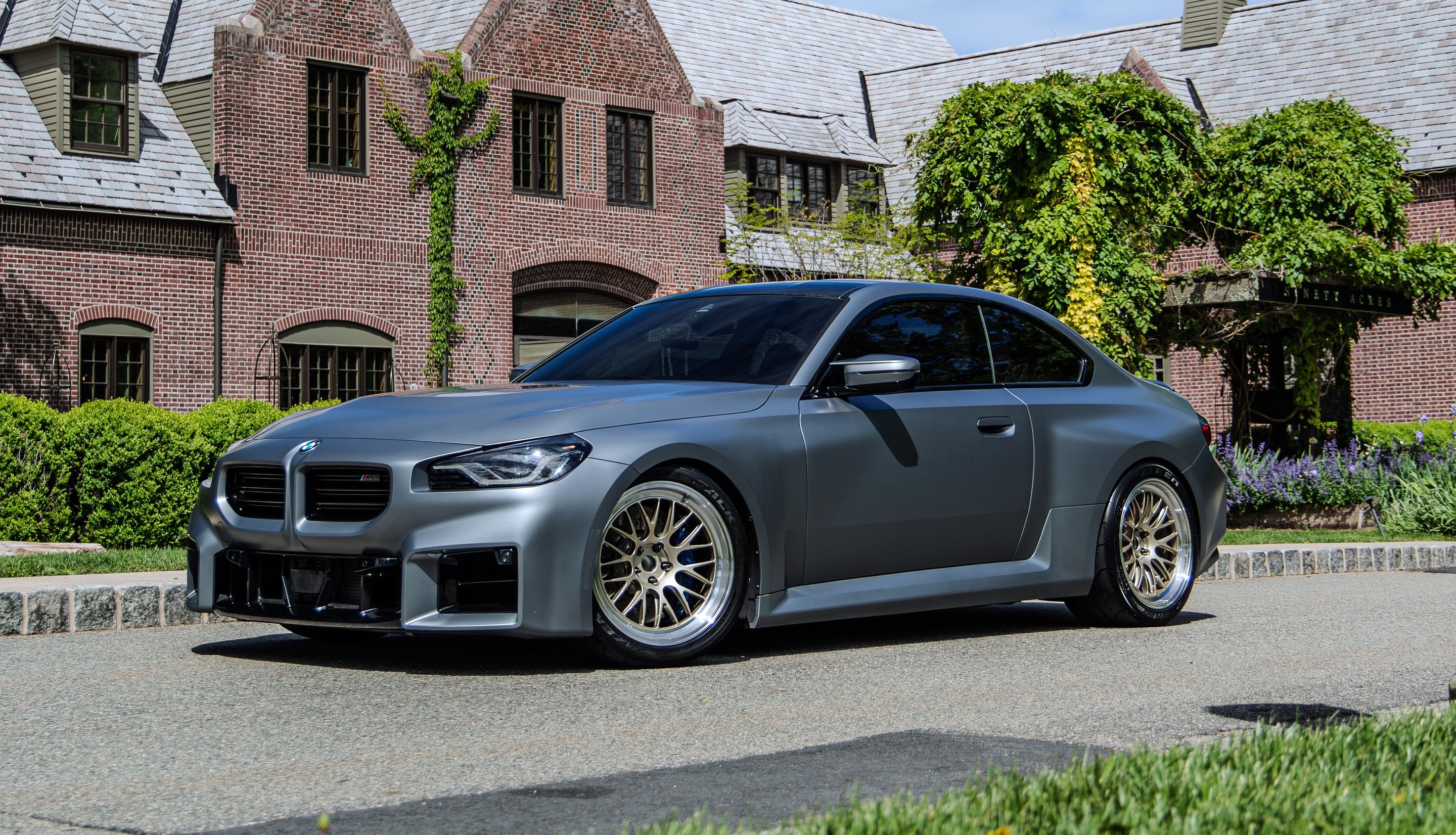 Grey BMW G87 M2 with 19" ML-10RT Apex wheels in Machined Lip Gloss Motorsport Gold
