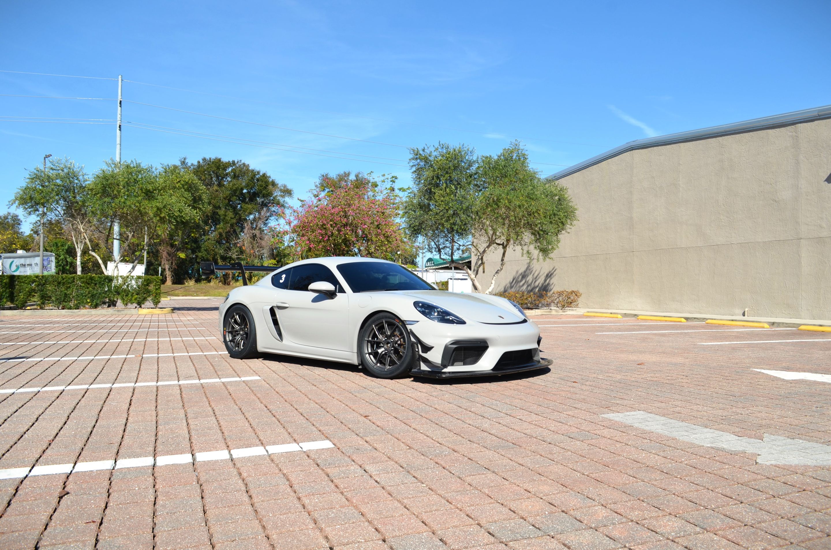 Grey Porsche 718 Cayman GT4 with 18" VS-5RS Apex wheels in Anthracite