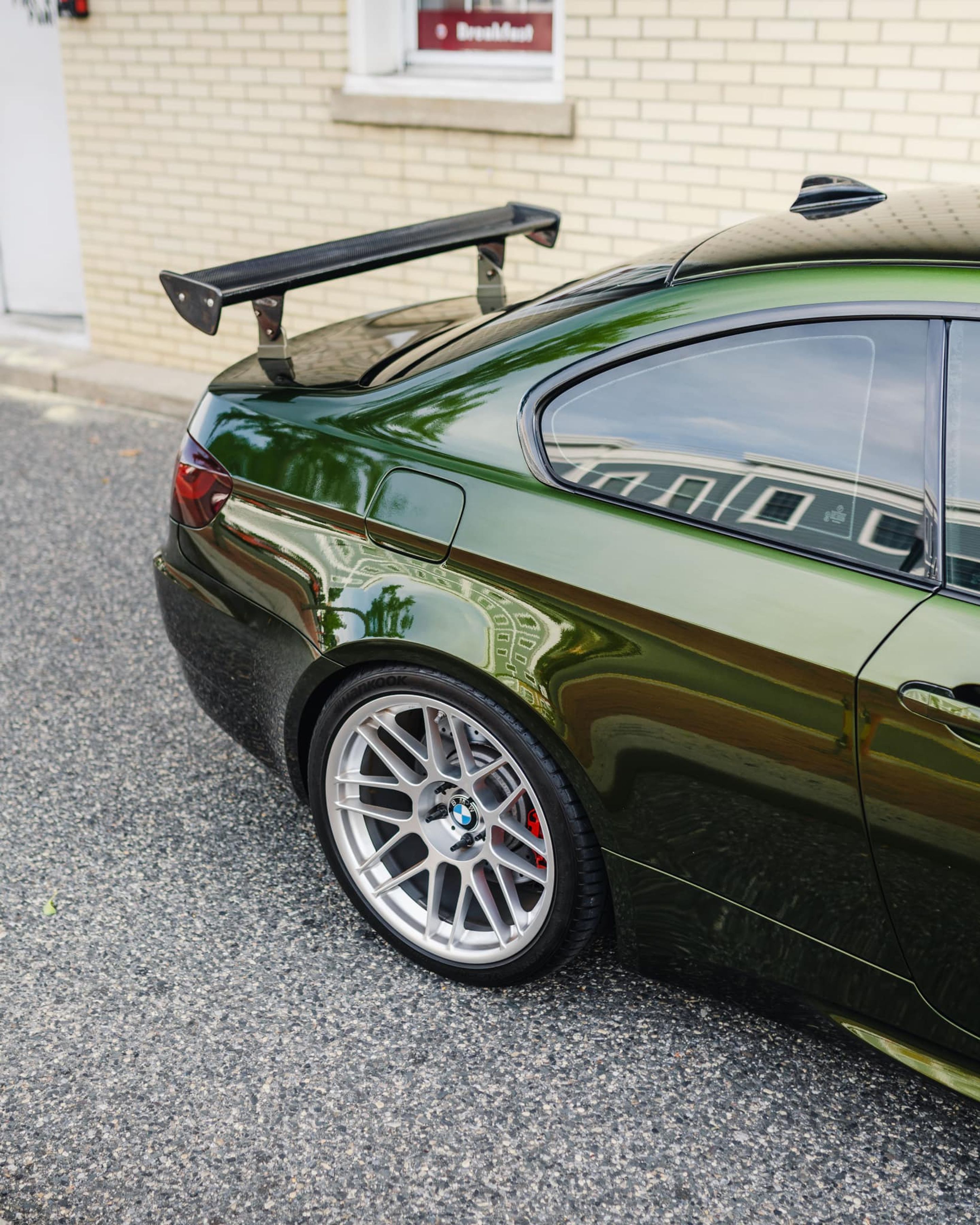 Green BMW E92 Coupe M3 with 19" ARC-8 Apex wheels in Hyper Silver