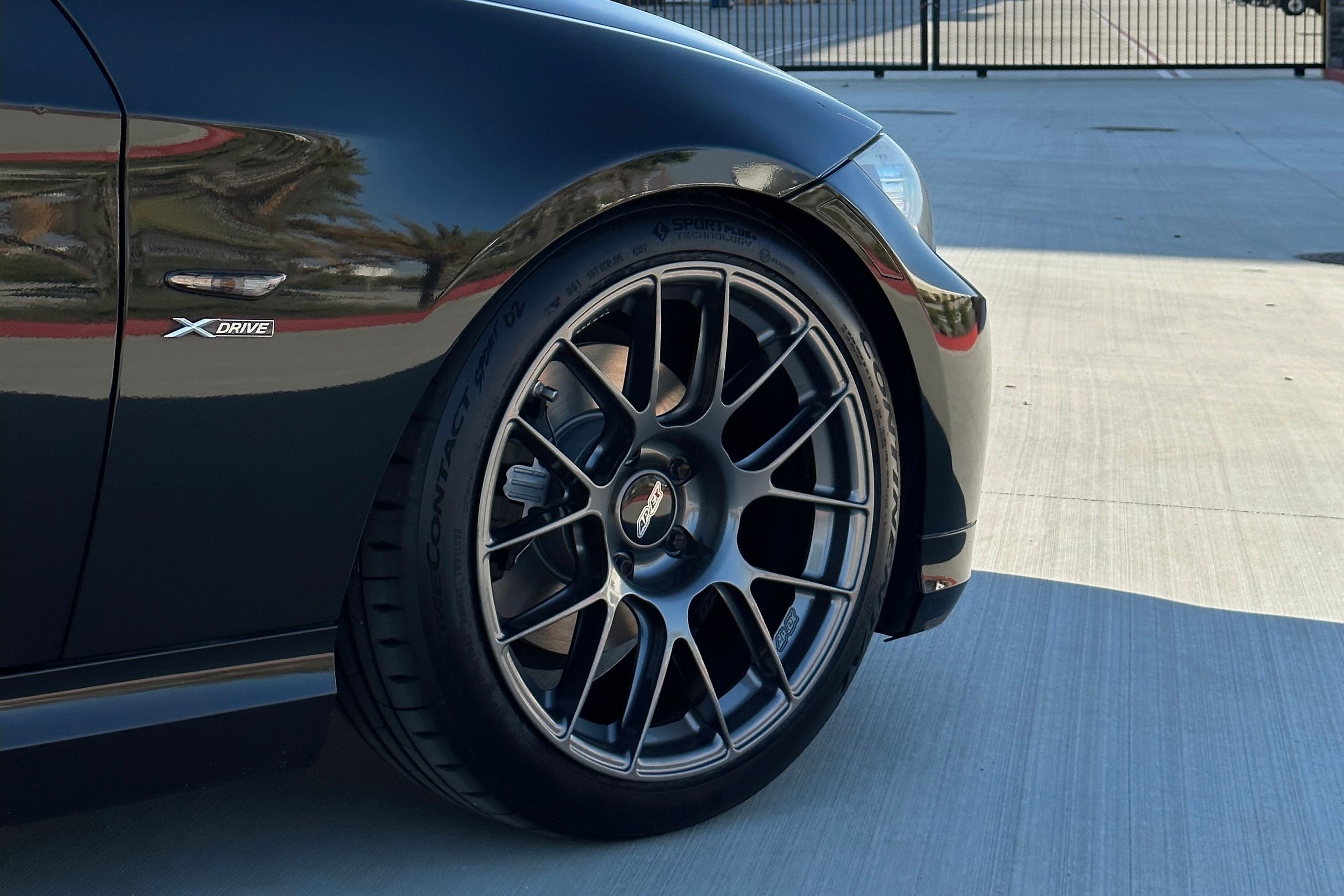 Grey BMW E91 Wagon 3 Series with 18" EC-7RS Apex wheels in Anthracite