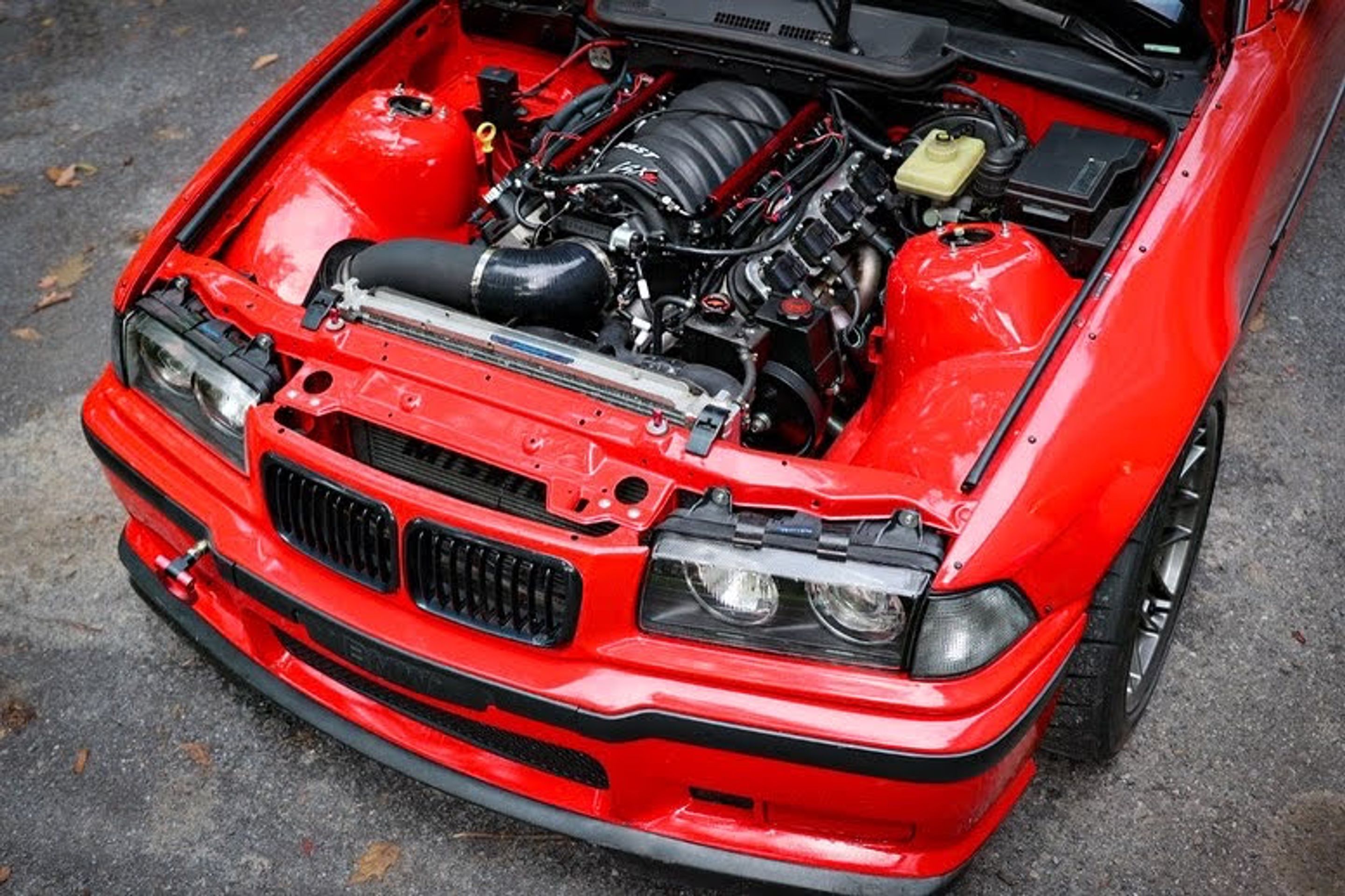 Red BMW E36 M3 with 17" ARC-8 Apex wheels in Anthracite