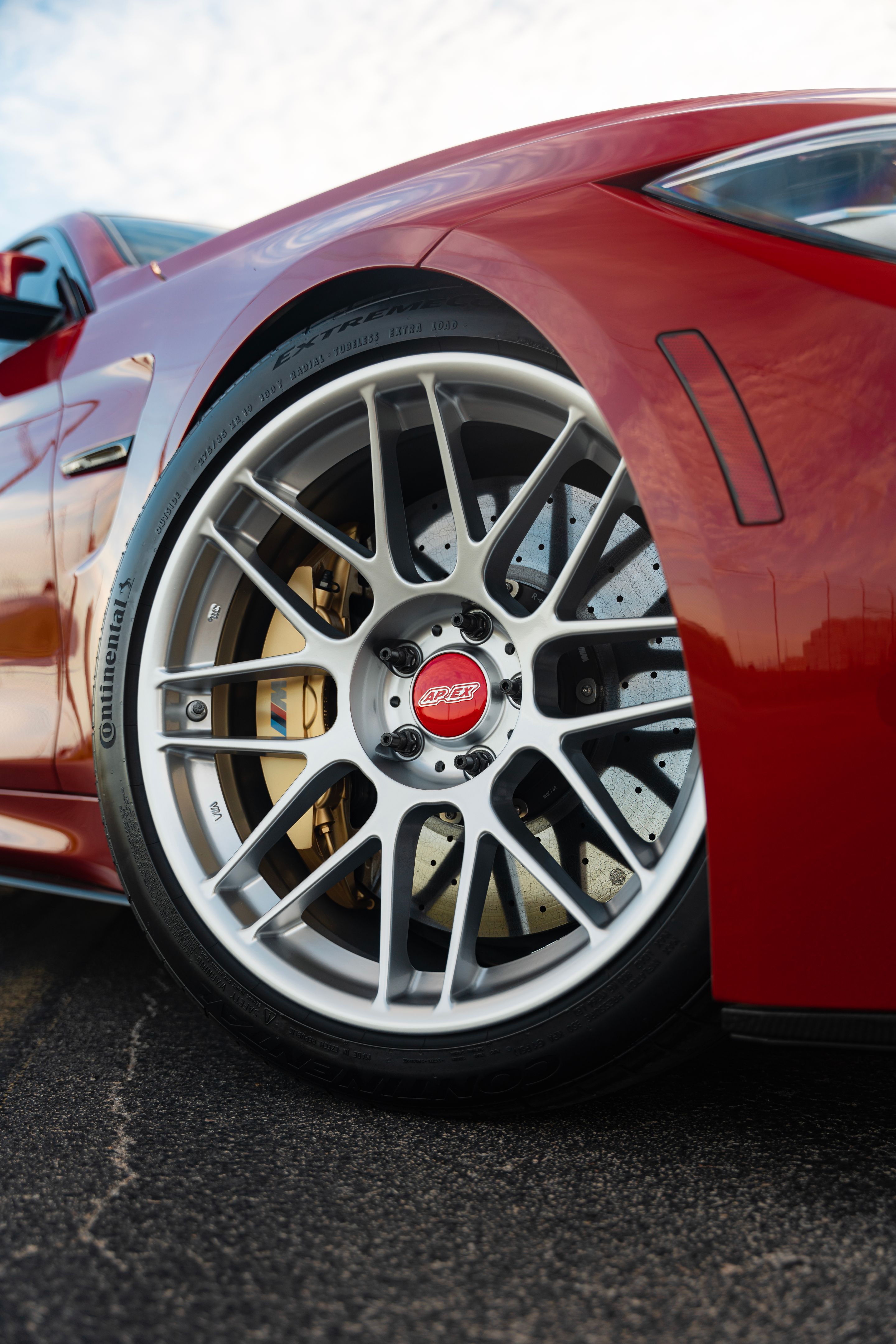 Red BMW F82 Coupe M4 with 19" ARC-8 Apex wheels in Hyper Silver