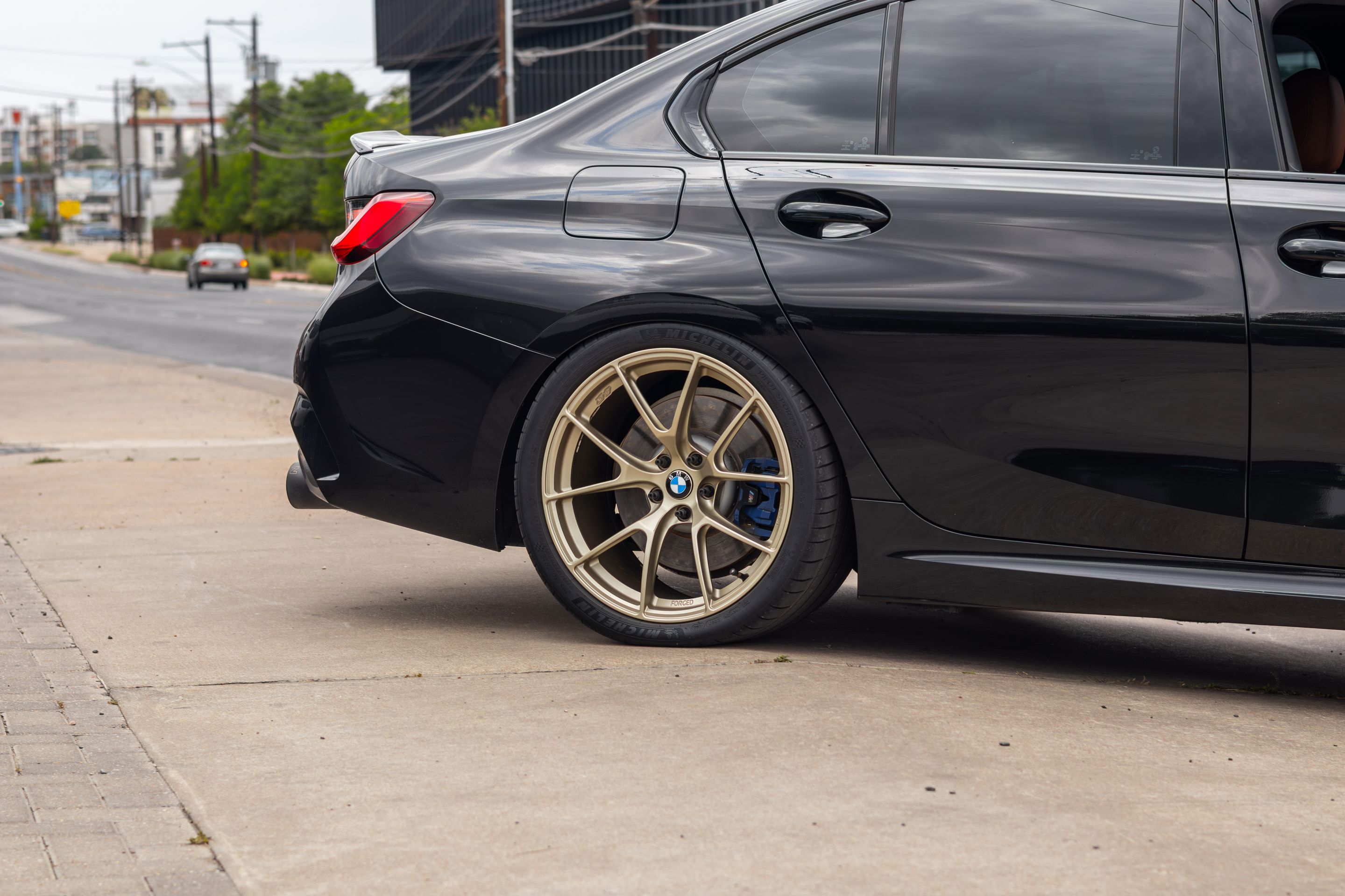 Black BMW G20 Sedan 3 Series with 19" VS-5RS Apex wheels in Motorsport Gold