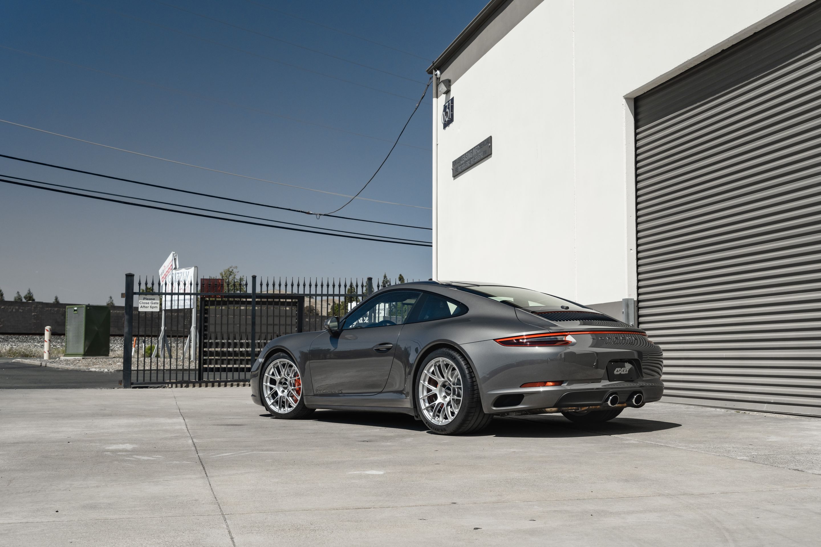 Grey Porsche 911 991.2 Carrera 4S with 19" EC-7RS Apex wheels in Race Silver