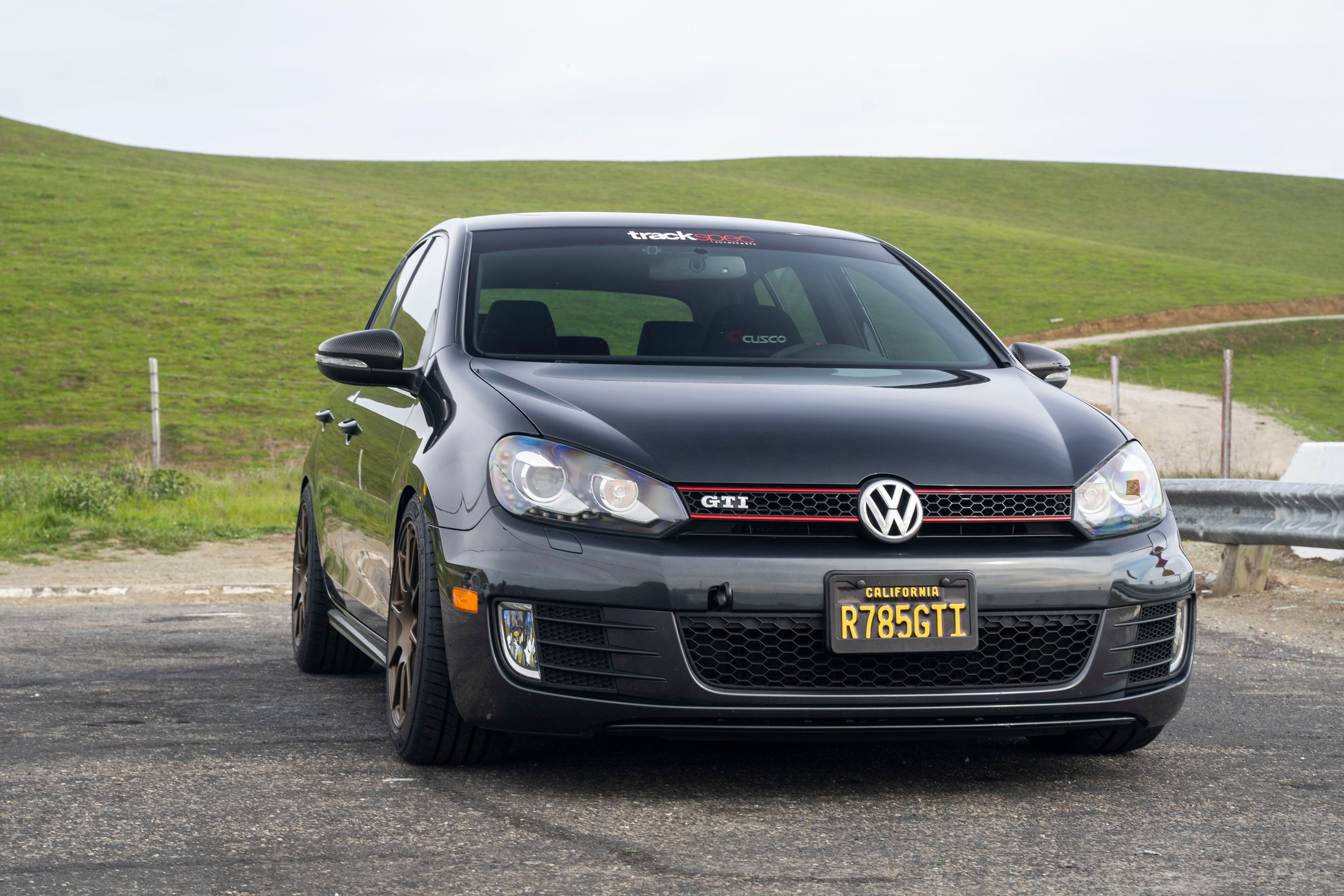 Grey VW MK6 GTI with 17" SM-10 Apex wheels in Satin Bronze