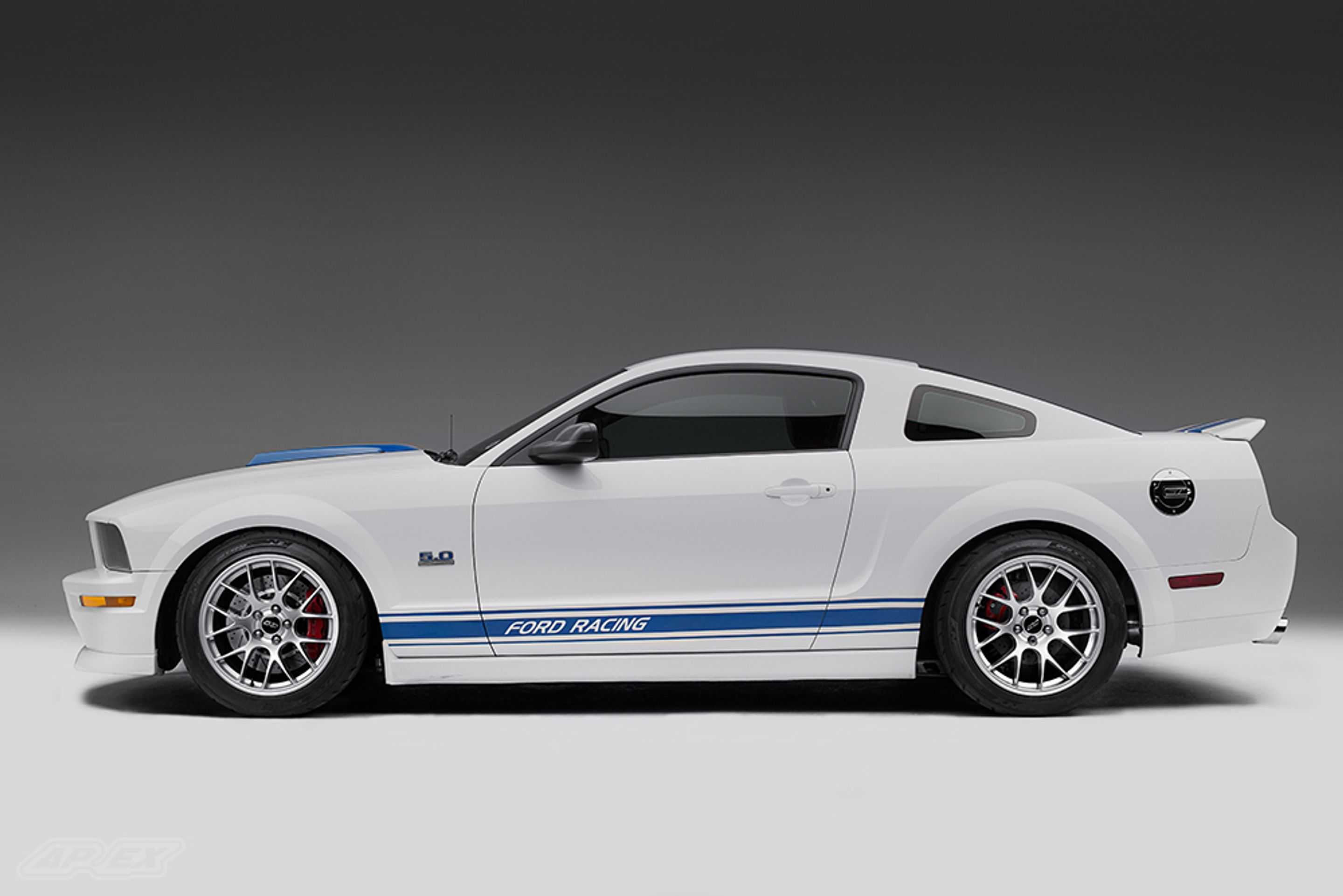 White Ford S197 Mustang GT with 18" EC-7 Apex wheels in Race Silver