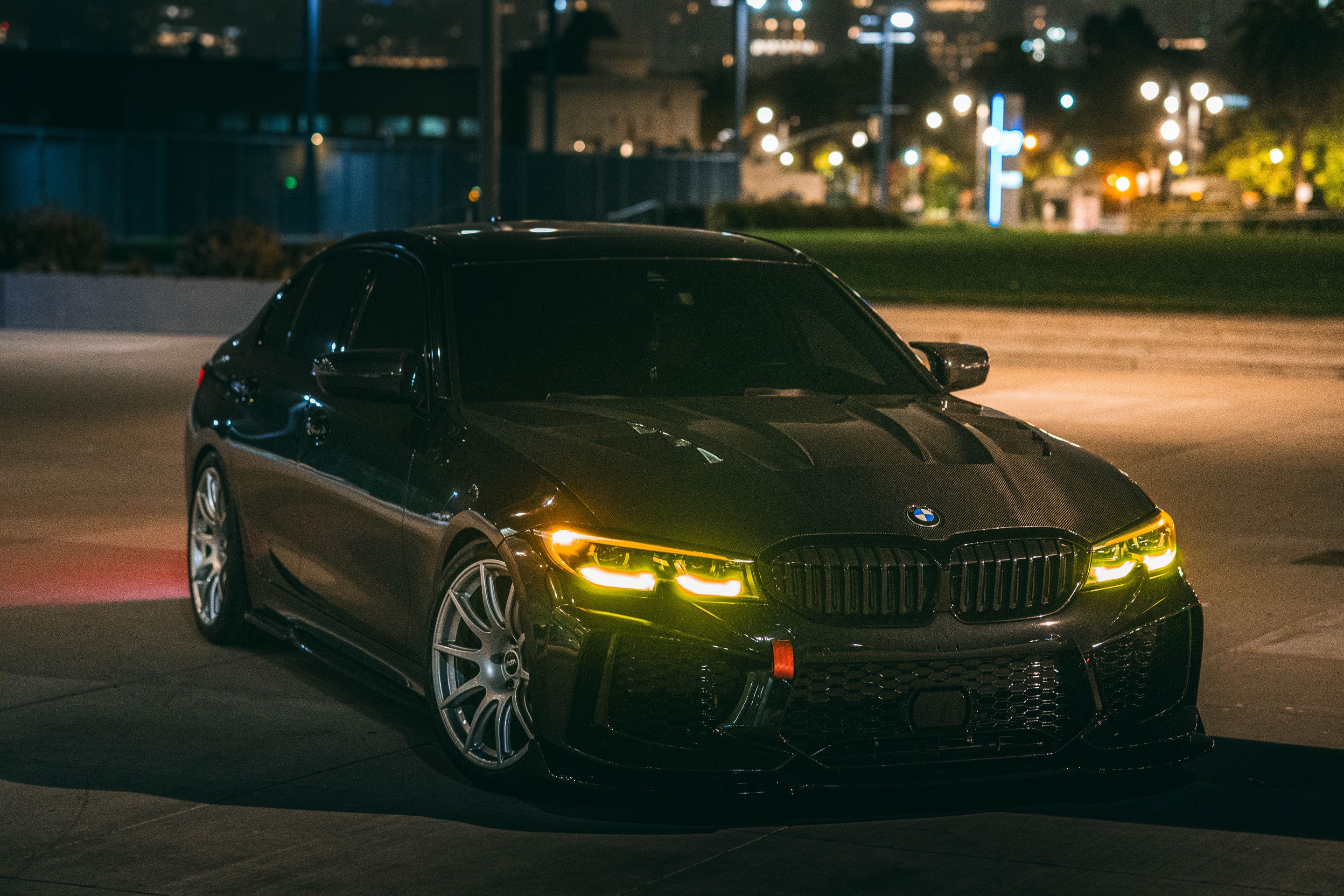 Black BMW G20 Sedan 3 Series with 19" SM-10 Apex wheels in Race Silver