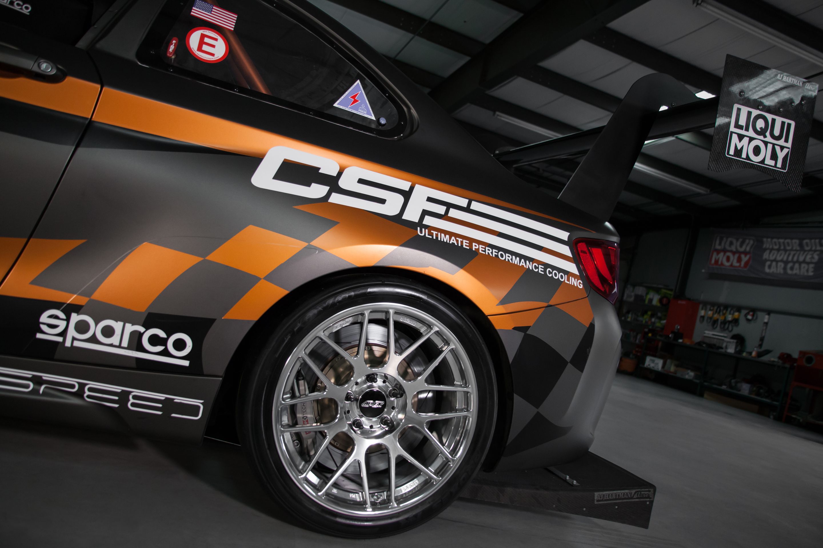 Multicolor BMW F87 M2 with 18" ARC-8R Apex wheels in Polished