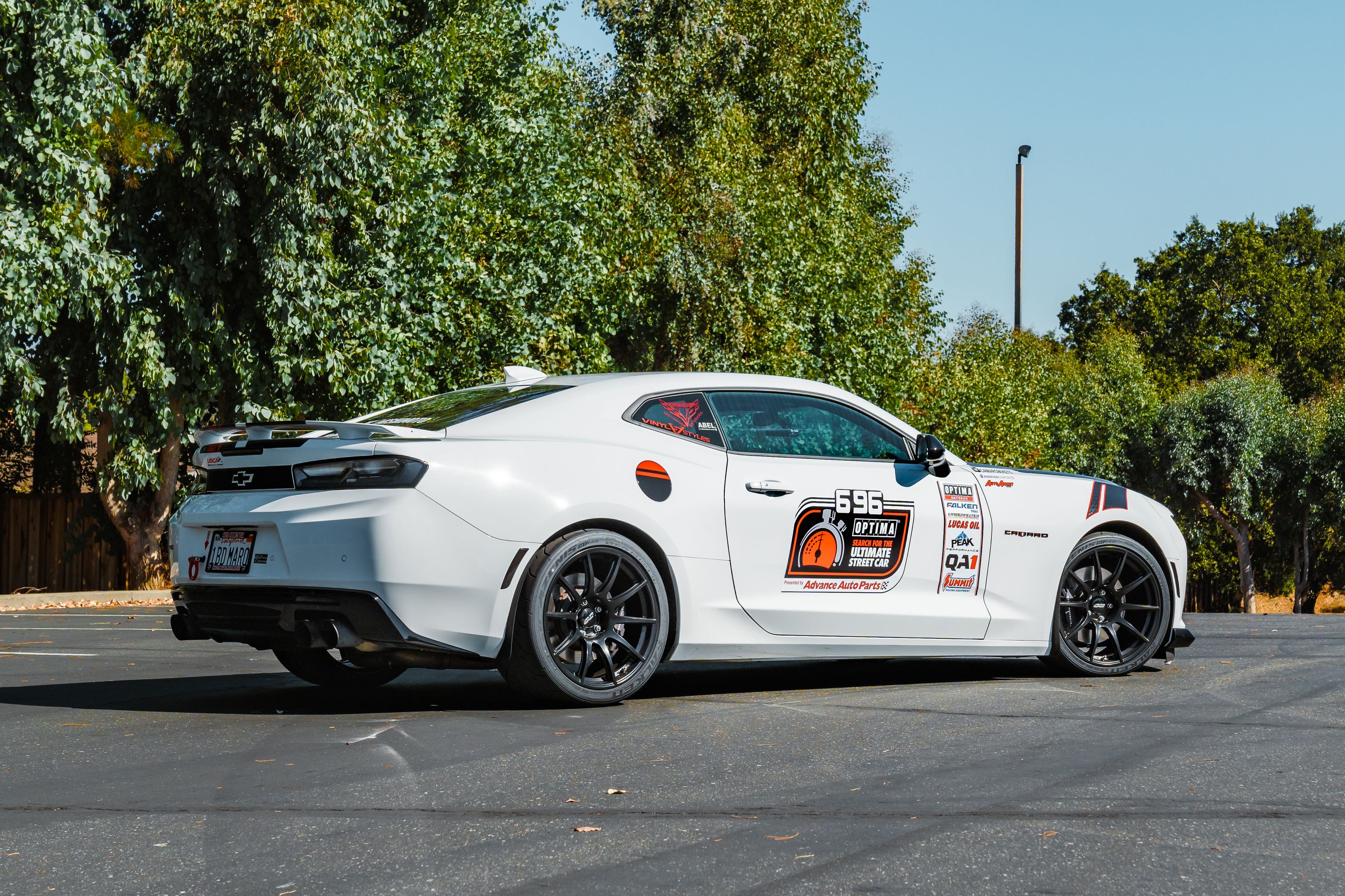 White Chevrolet 6th Gen Camaro SS with 19" SM-10 Apex wheels in Satin Black