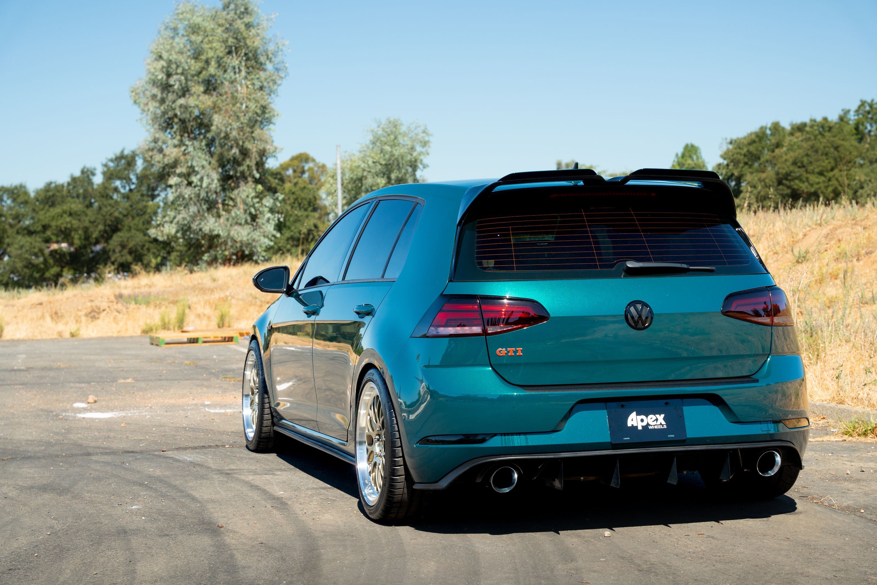 Green VW MK7 GTI with 18" ML-10RT Apex wheels in Machined Lip Gloss Motorsport Gold