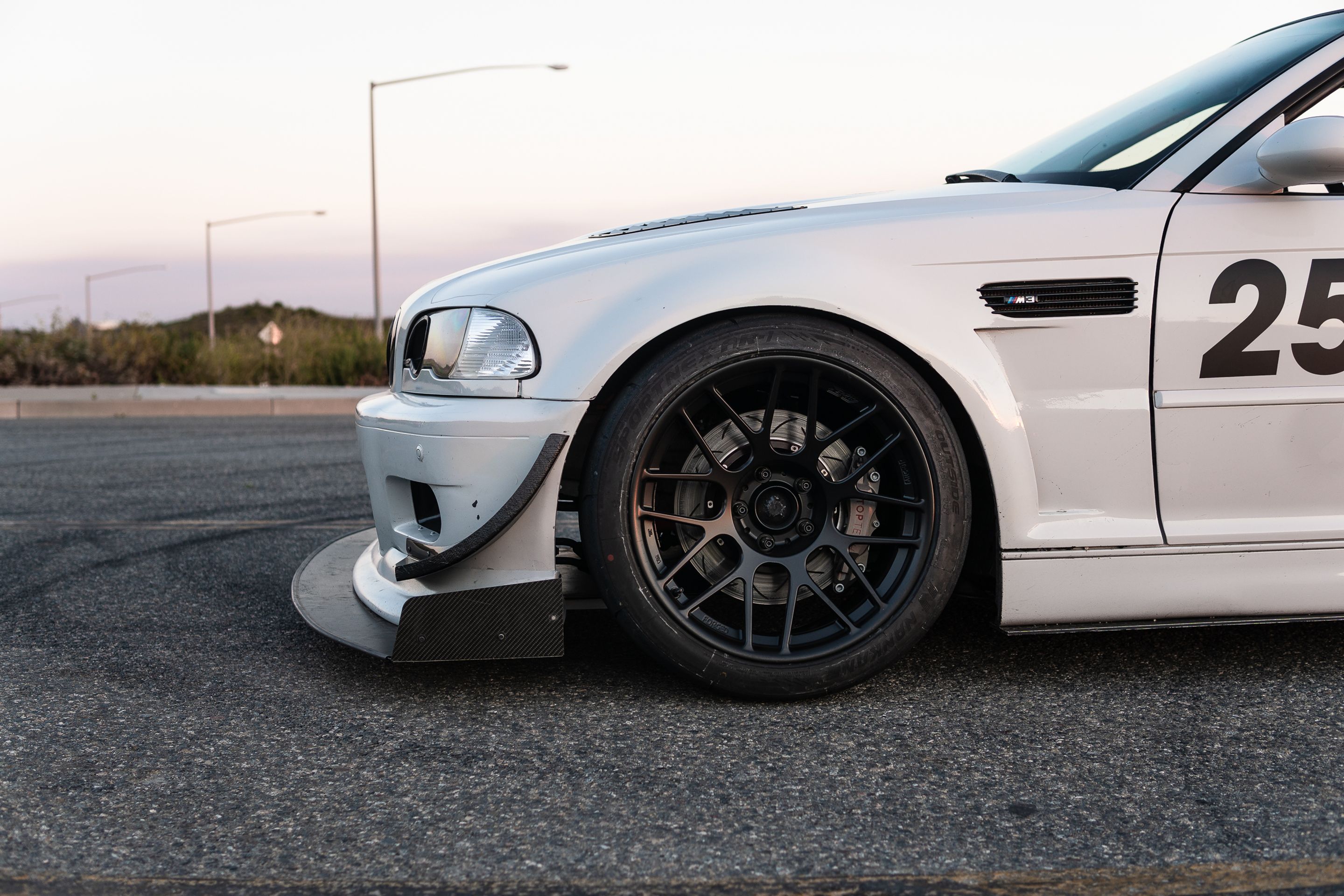 White BMW E46 M3 with 18" ARC-8R Apex wheels in Satin Black