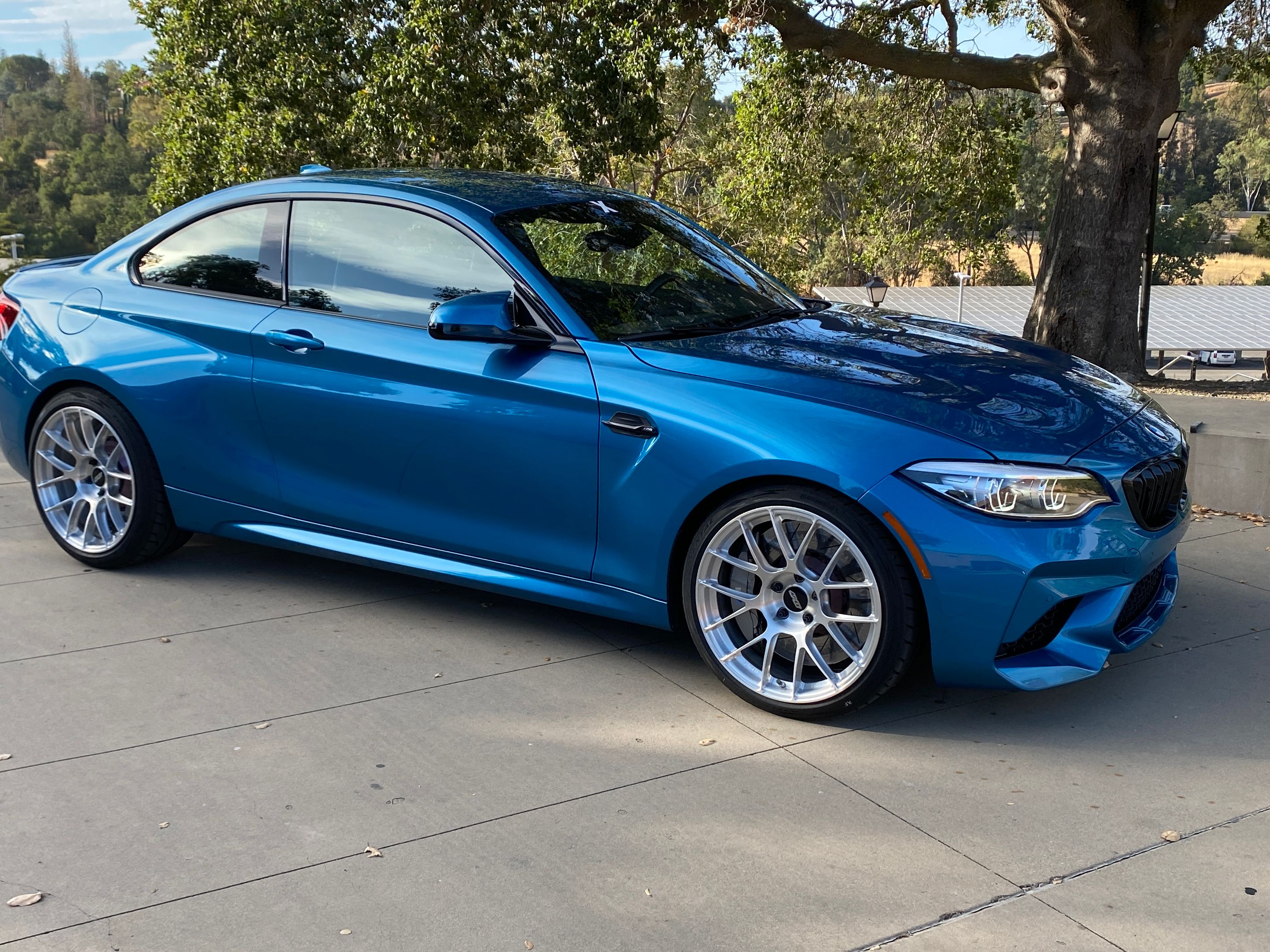 Blue BMW F87 M2 with 19" EC-7RS Apex wheels in Brushed Clear