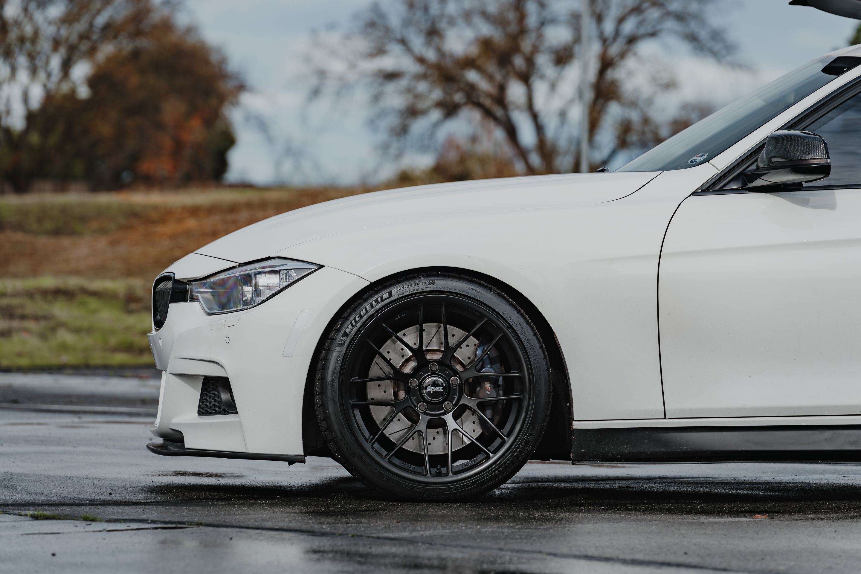 White BMW F31 Wagon 3 Series with 19" ARC-8RT Apex wheels in Satin Black
