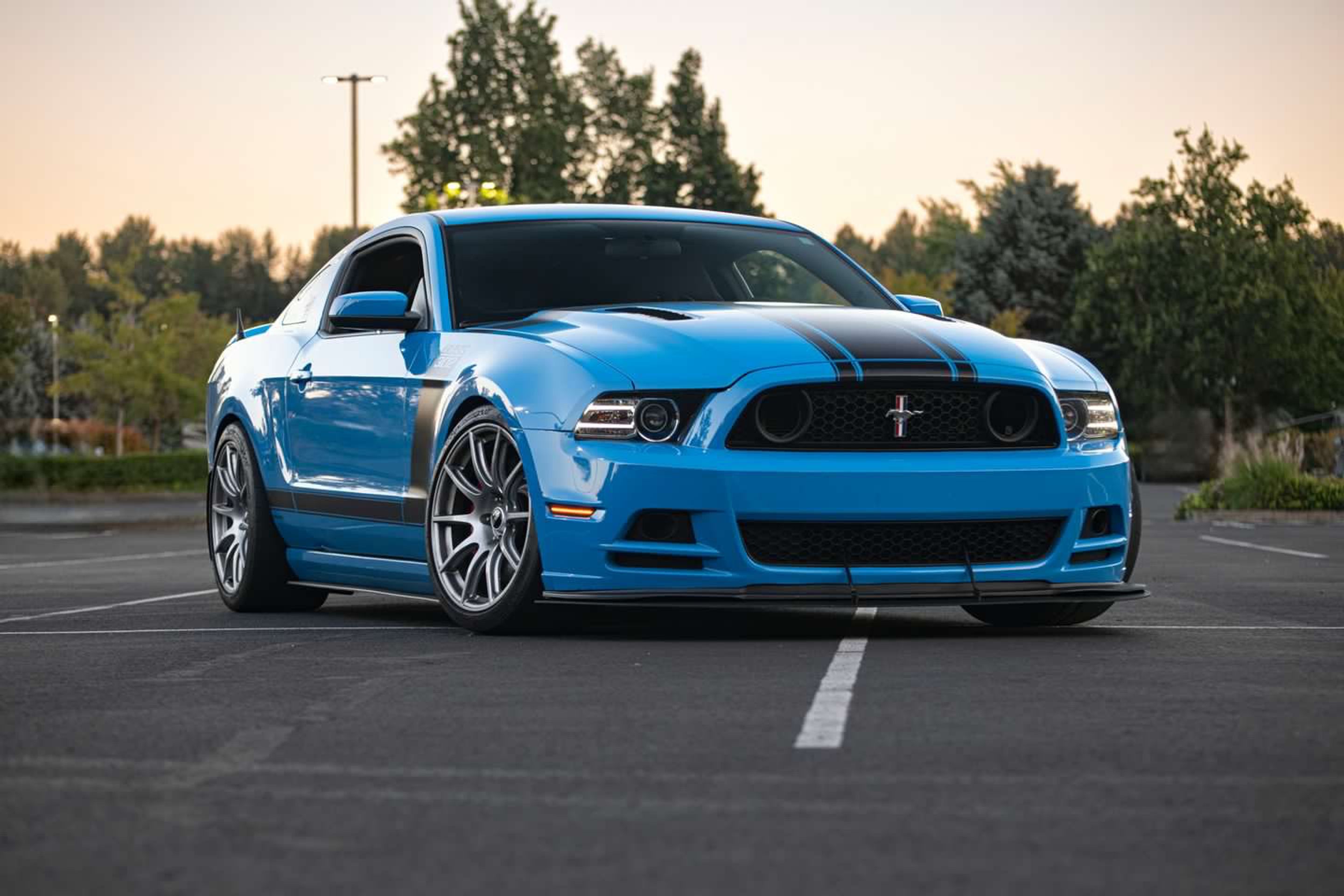 Blue Ford S197 Mustang Boss 302 with 19" SM-10 Apex wheels in Race Silver