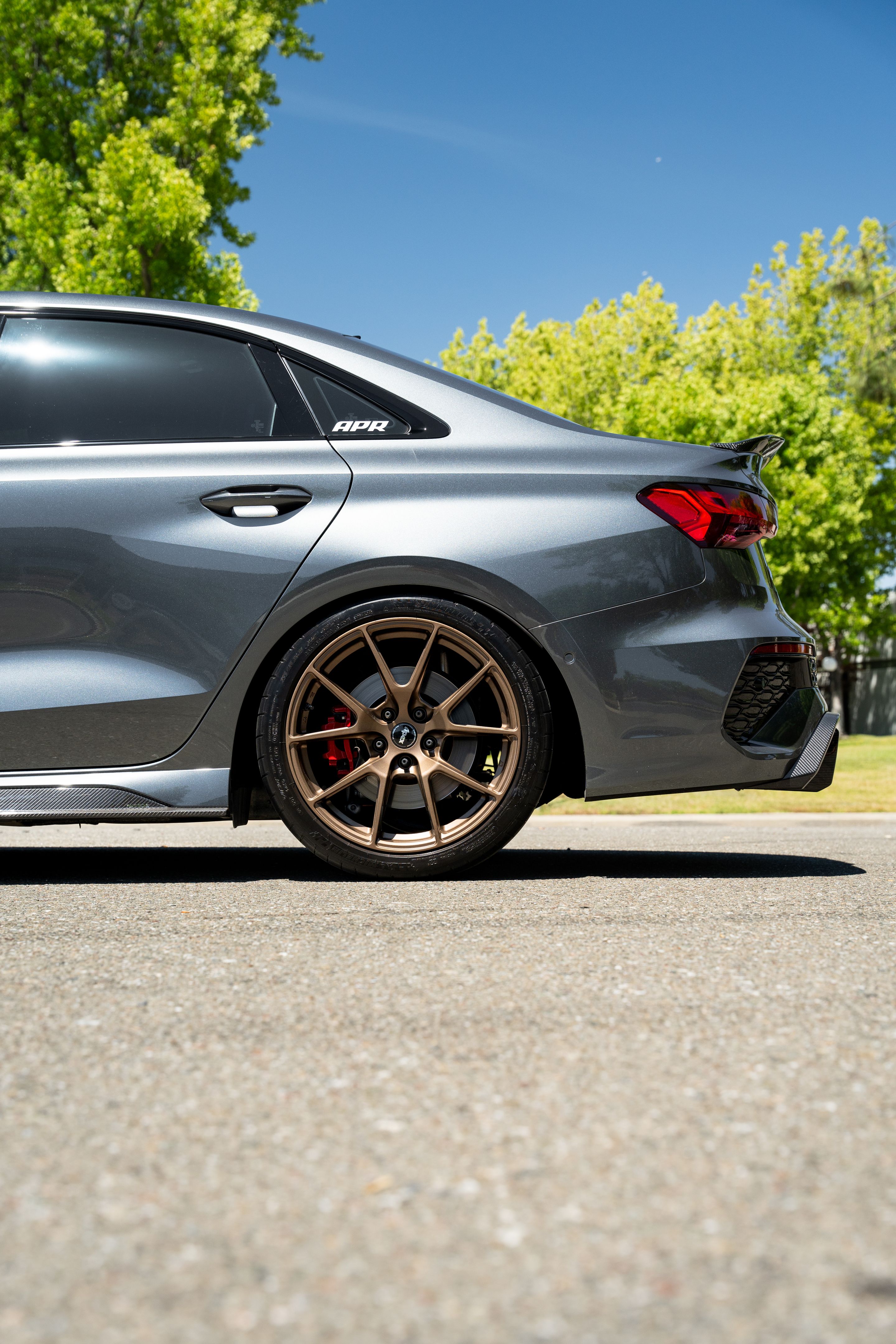 Grey Audi 8Y RS 3 with 18" VS-5 Apex wheels in Satin Bronze