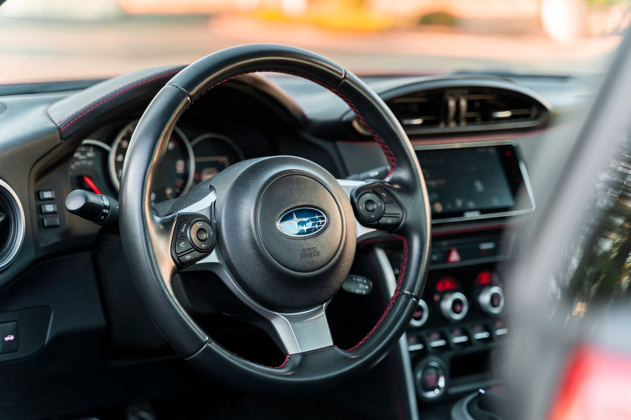 Red Subaru ZC6 / Gen 1 BRZ with 17" EC-7R Apex wheels in Anthracite