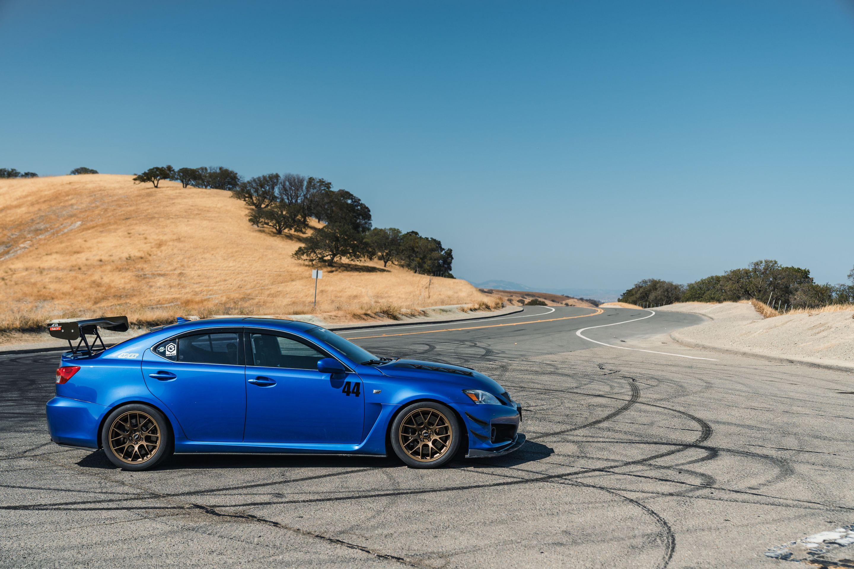 Blue Lexus USE20 IS-F with 18" EC-7 Apex wheels in Satin Bronze