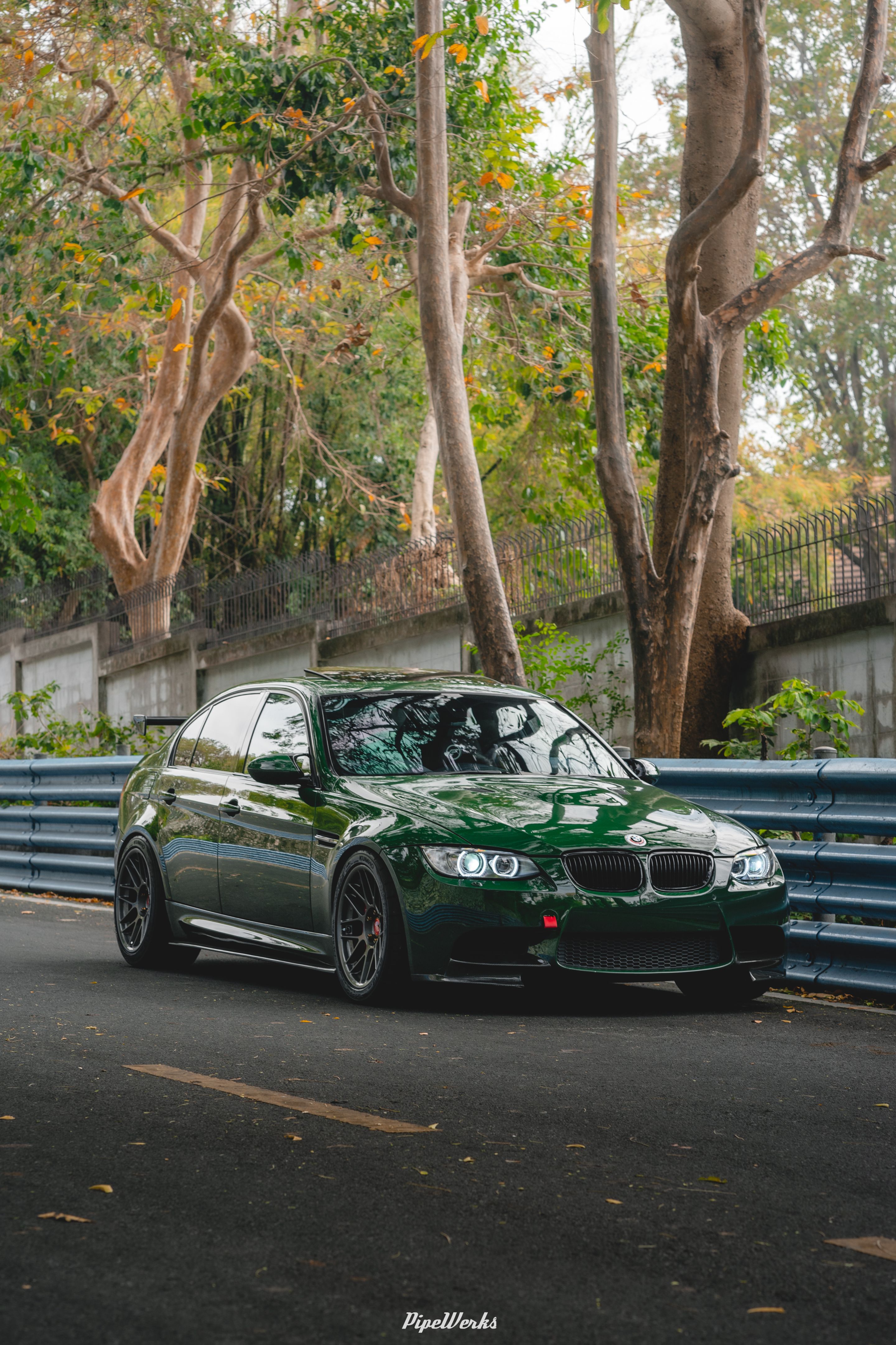 Green BMW E90 Sedan 3 Series with 18" ARC-8 Apex wheels in Anthracite