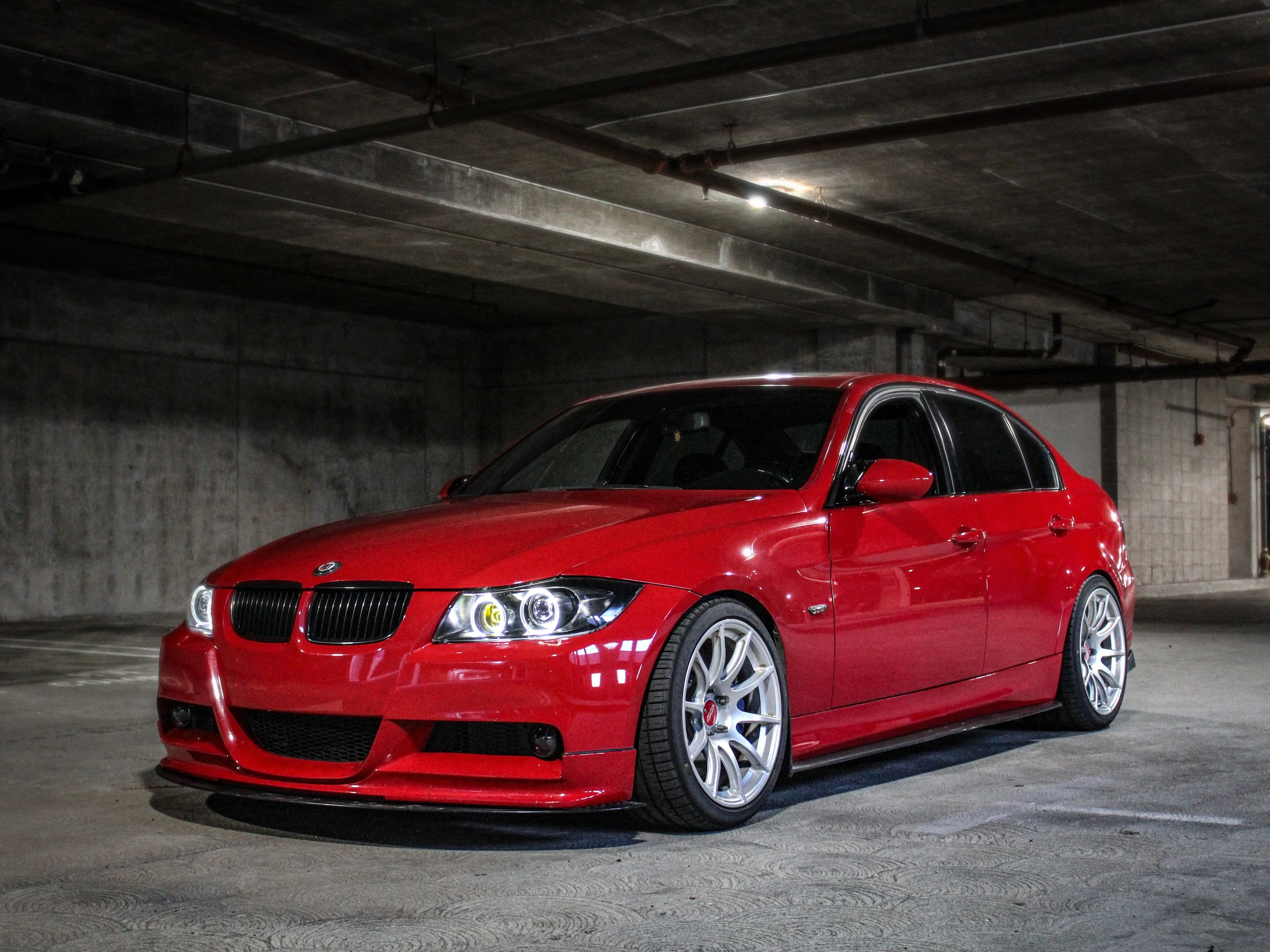 Red BMW E90 Sedan 3 Series with 18" SM-10 Apex wheels in Race Silver