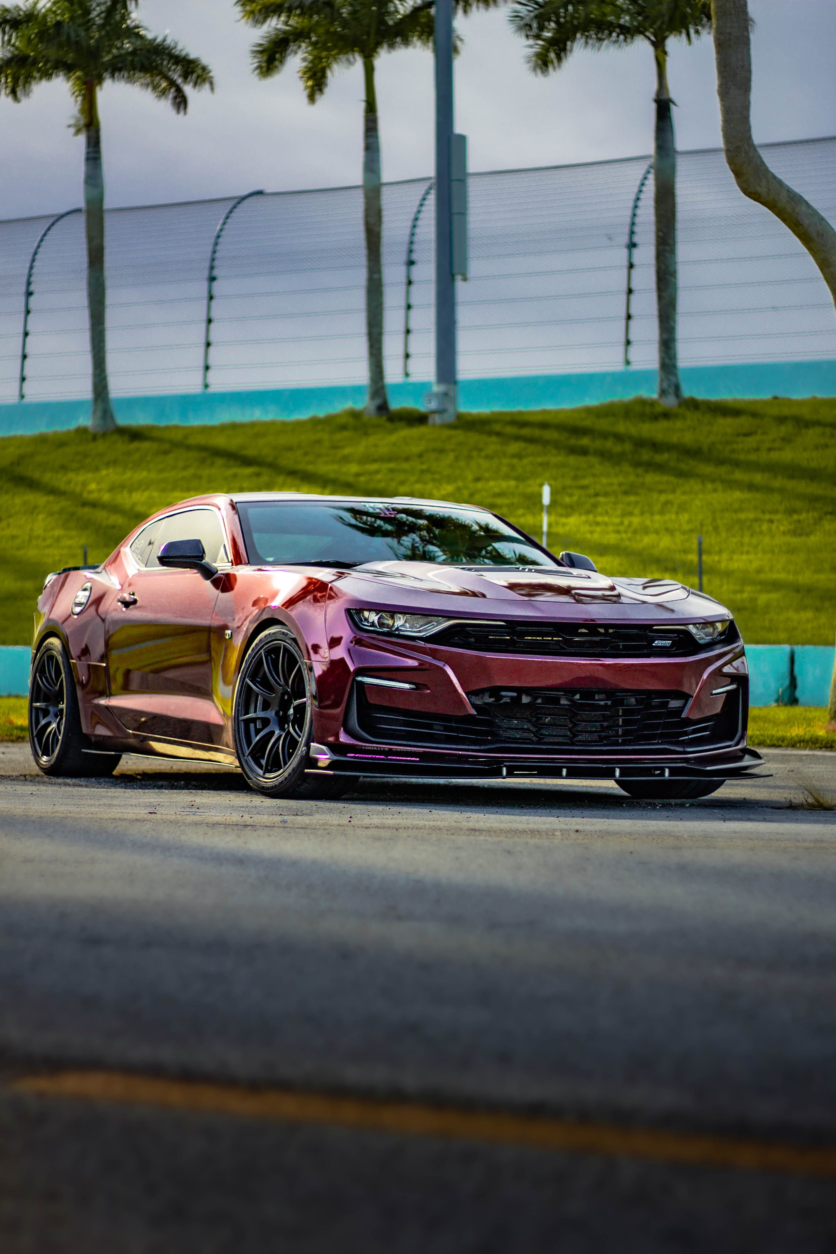 Red Chevrolet 6th Gen Camaro SS with 19" SM-10 Apex wheels in Satin Black