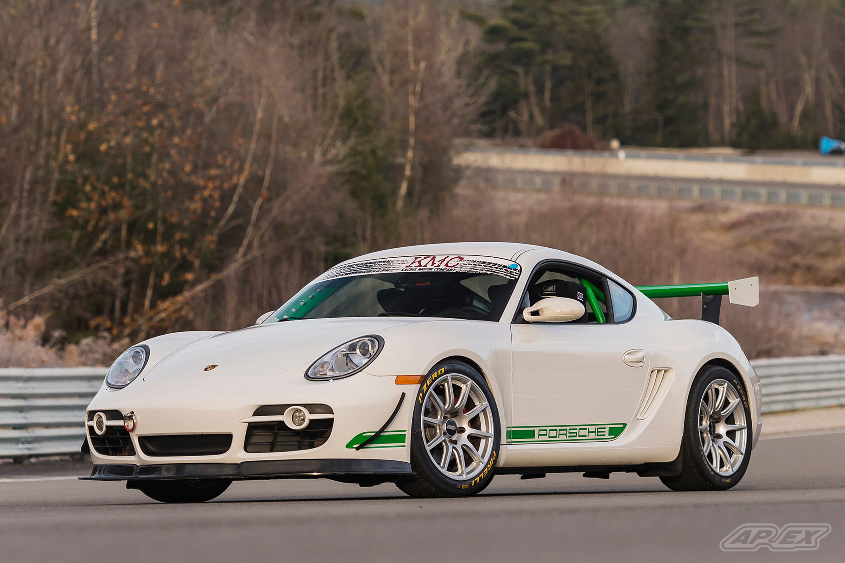 White Porsche 987 Cayman S with 18" SM-10 Apex wheels in Race Silver