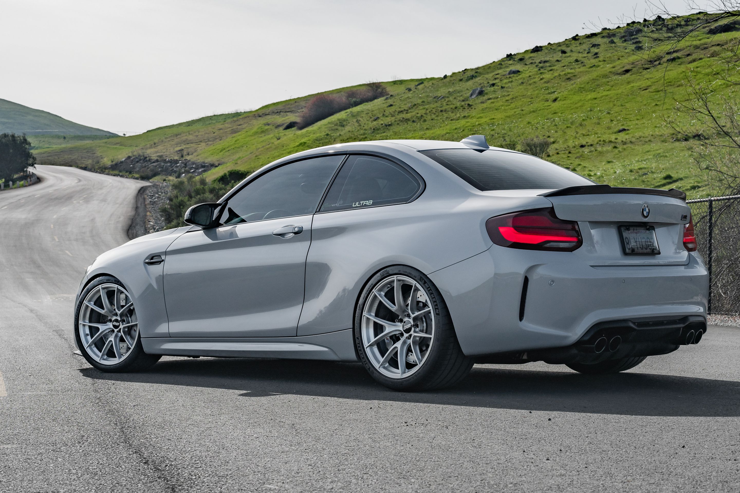 Silver BMW F87 M2 with 19" VS-5RS Apex wheels in Brushed Clear