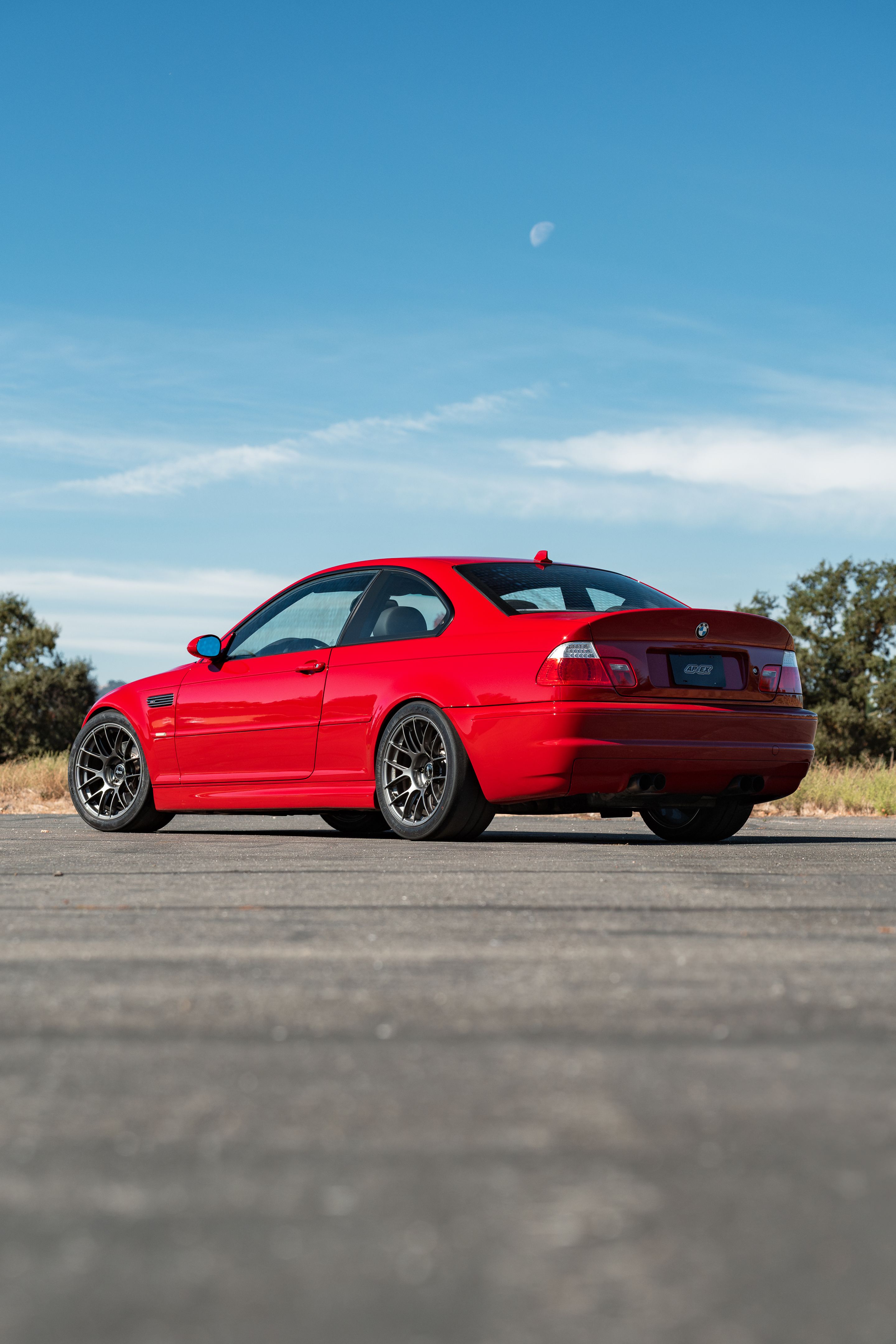 Red BMW E46 M3 with 18" EC-7RS Apex wheels in Anthracite