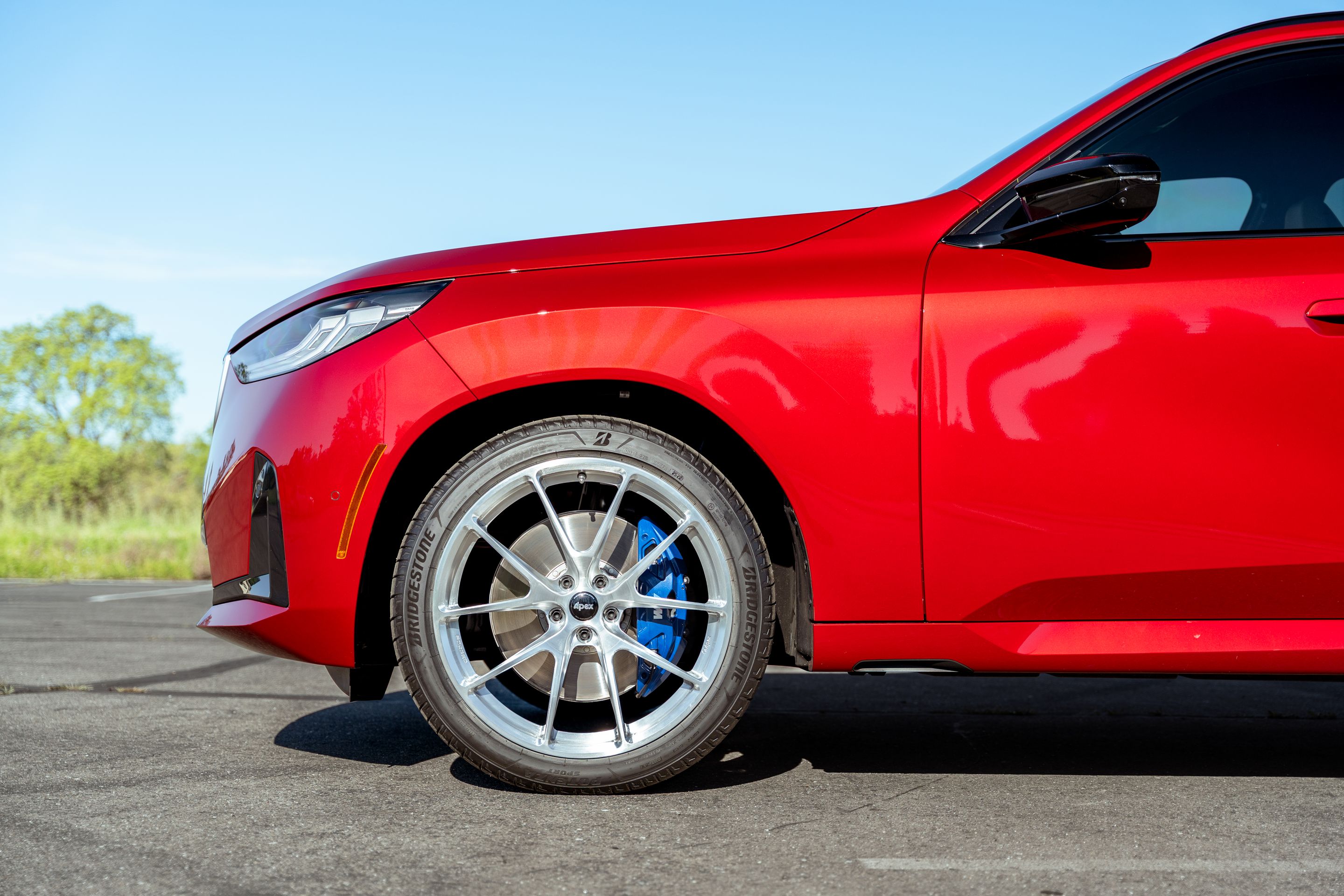 Red BMW G45 X3 with 21" VS-5RX Apex wheels in Brushed Clear