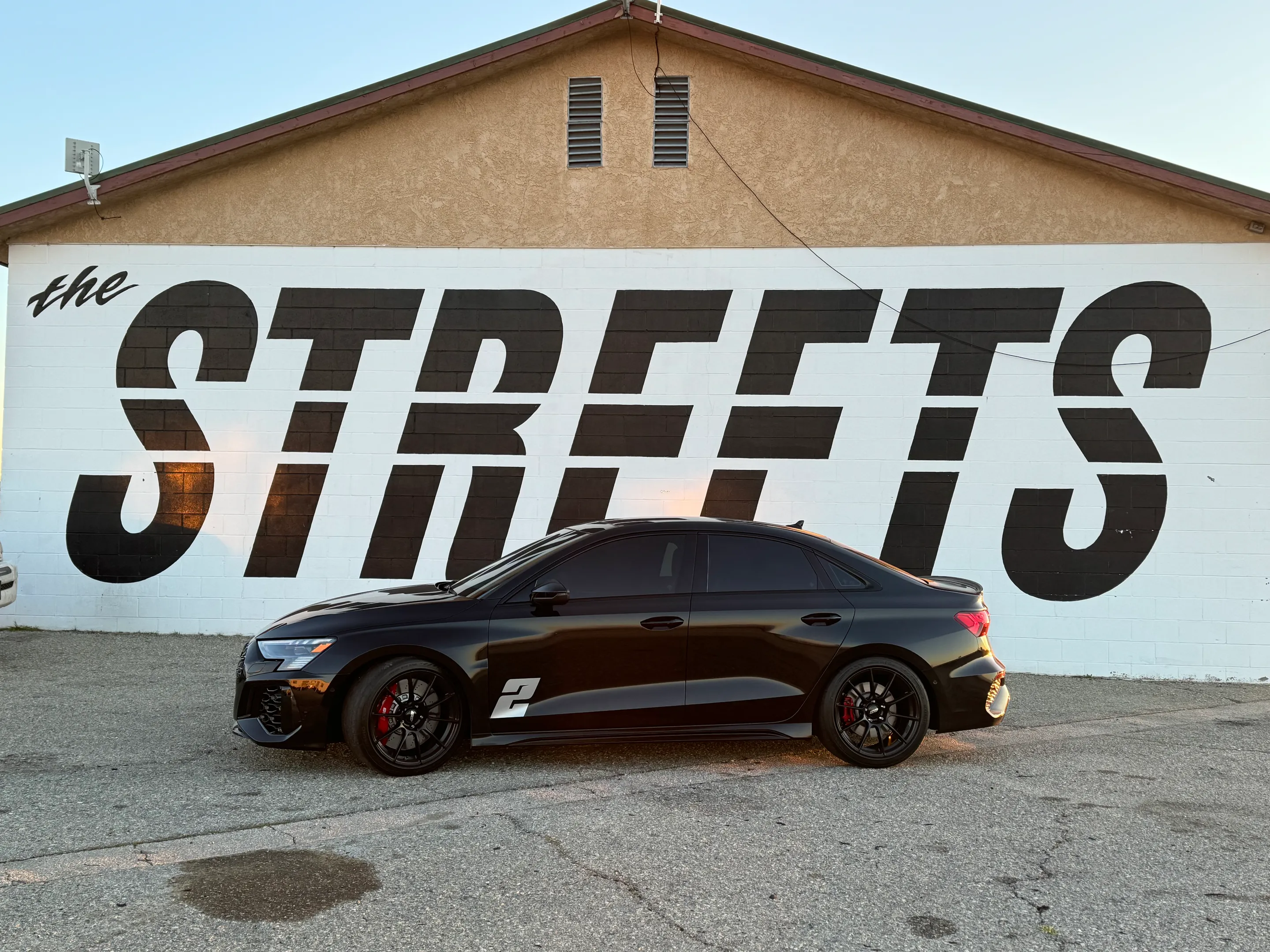 Black Audi 8Y RS 3 with 18" SM-10RS Apex wheels in Satin Black