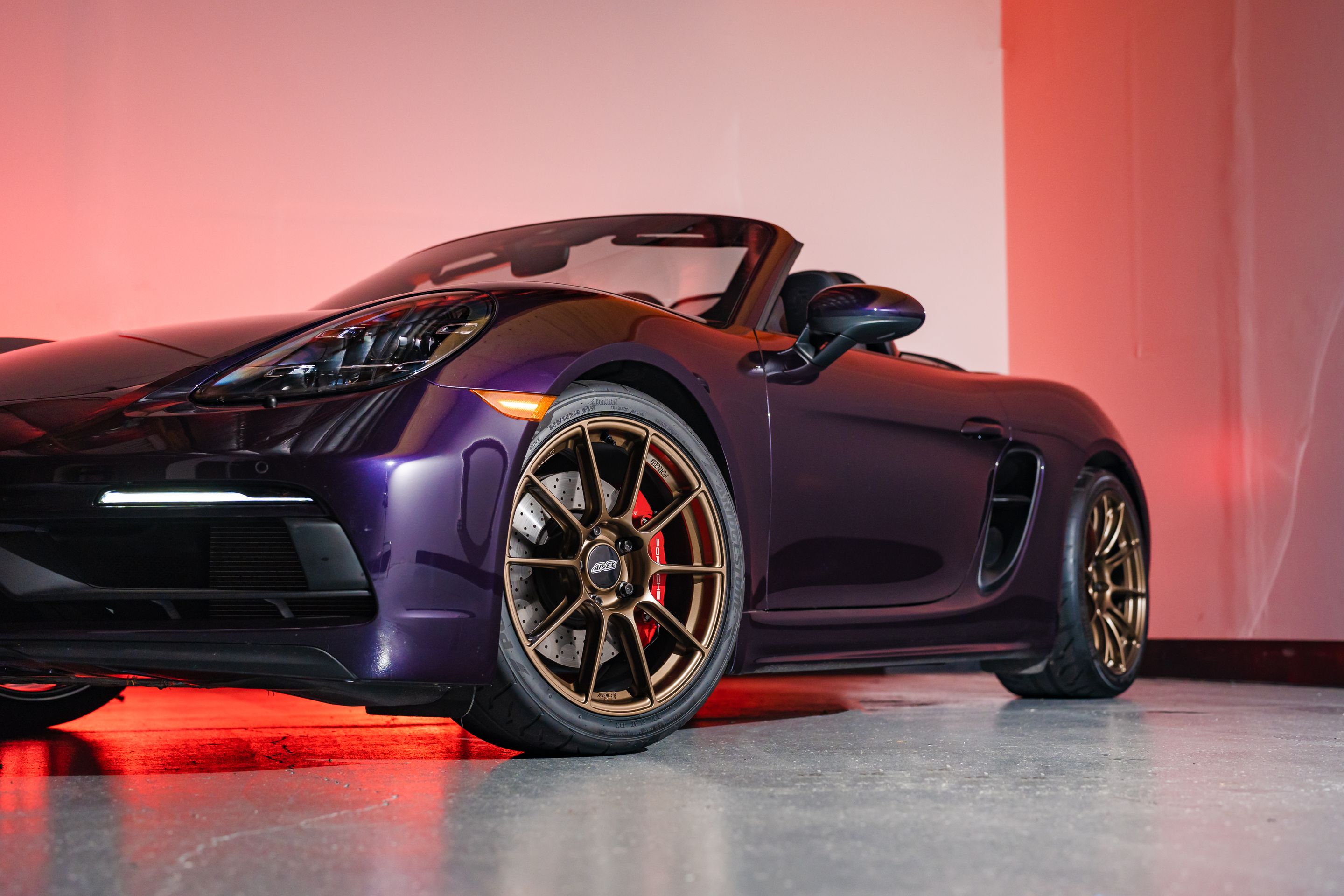 Purple Porsche 718 Boxster GTS 4.0L with 19" SM-10RS Apex wheels in Satin Bronze