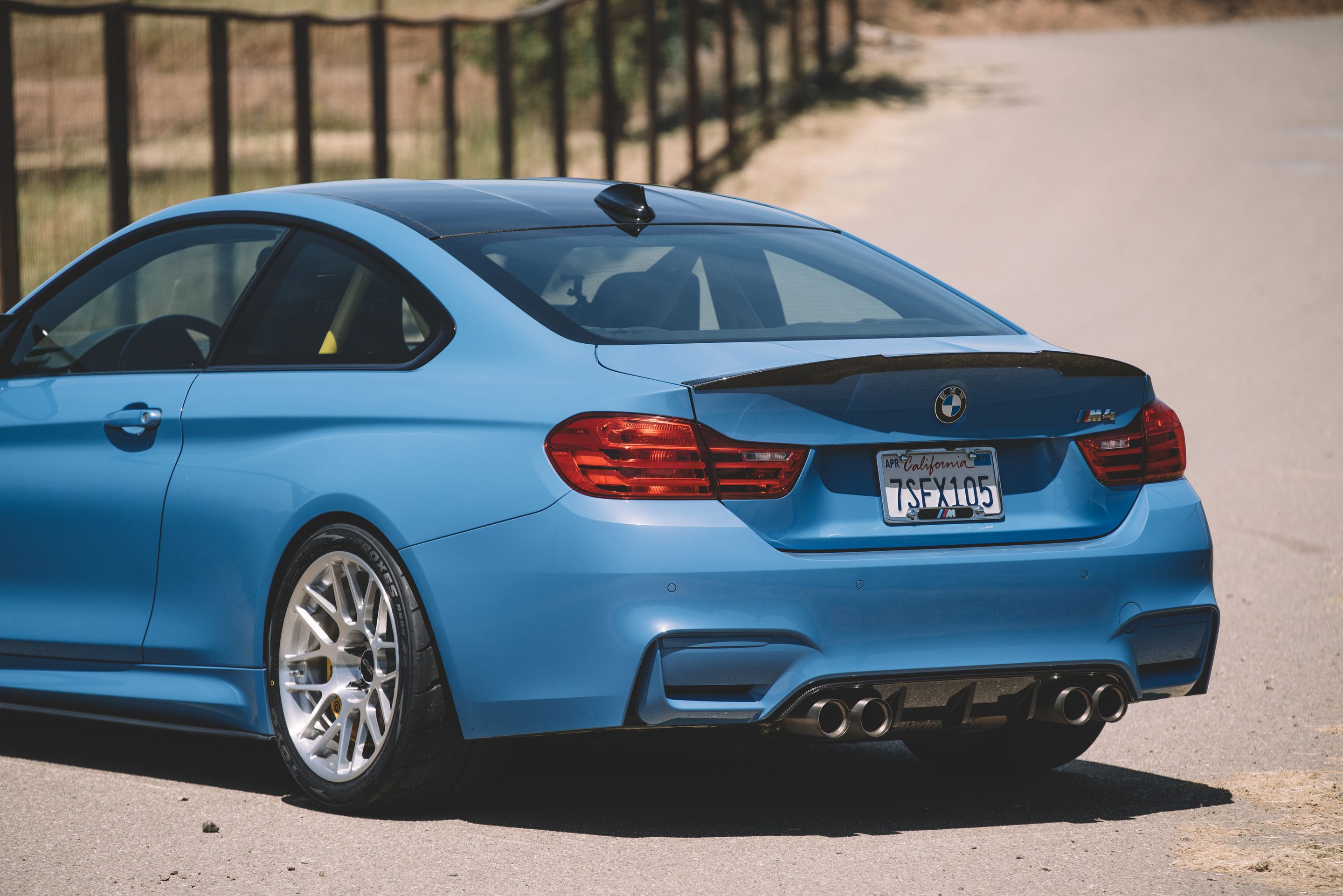Blue BMW F82 Coupe M4 with 18" ARC-8R Apex wheels in Brushed Clear